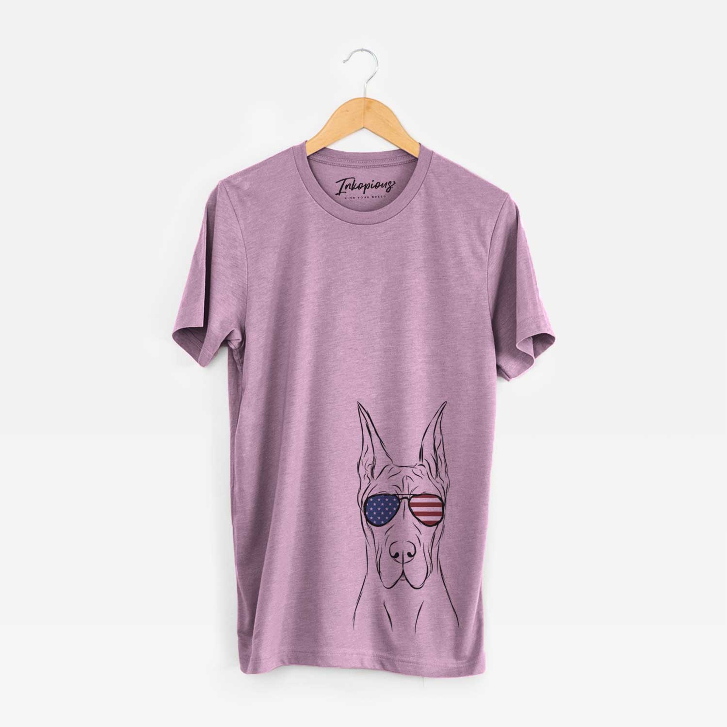 Hand-drawn sketch of Jude the Great Dane wearing American flag sunglasses on an Orchid Unisex crewneck