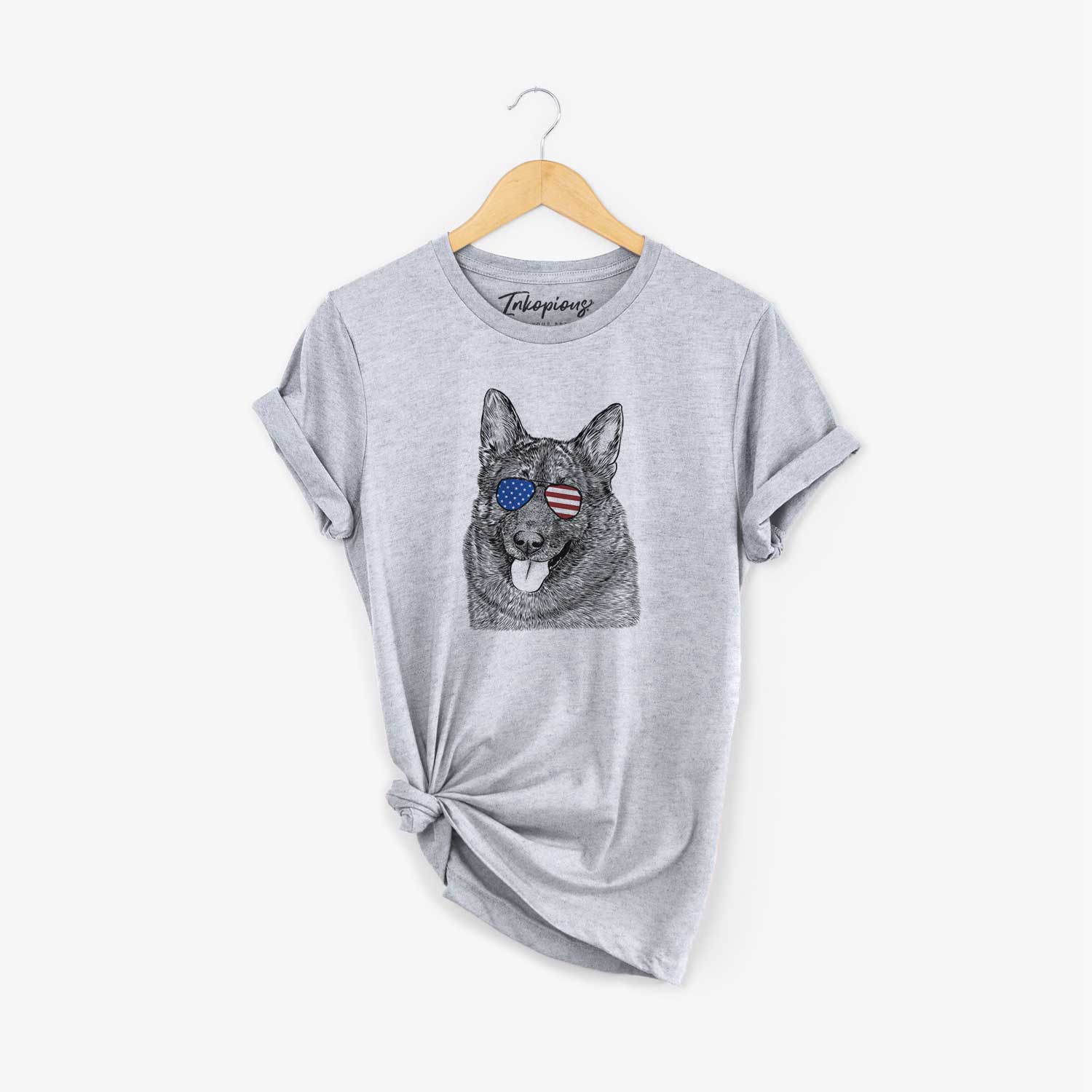 Hand-drawn sketch of Kasia the Norwegian Elkhound wearing American flag sunglasses on a Grey Unisex crewneck
