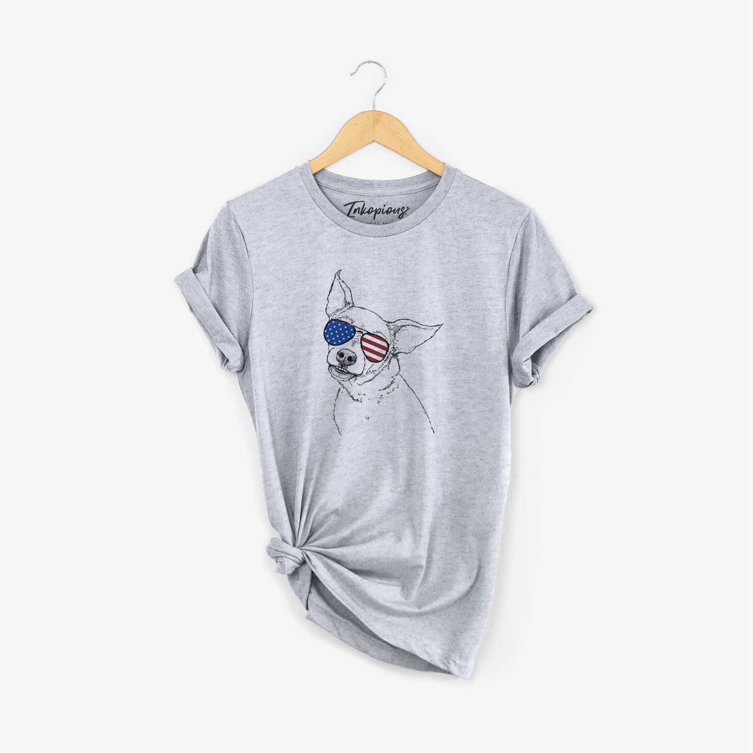 Hand-drawn sketch of Lola the Chiweenie wearing American flag sunglasses on a Grey Unisex crewneck