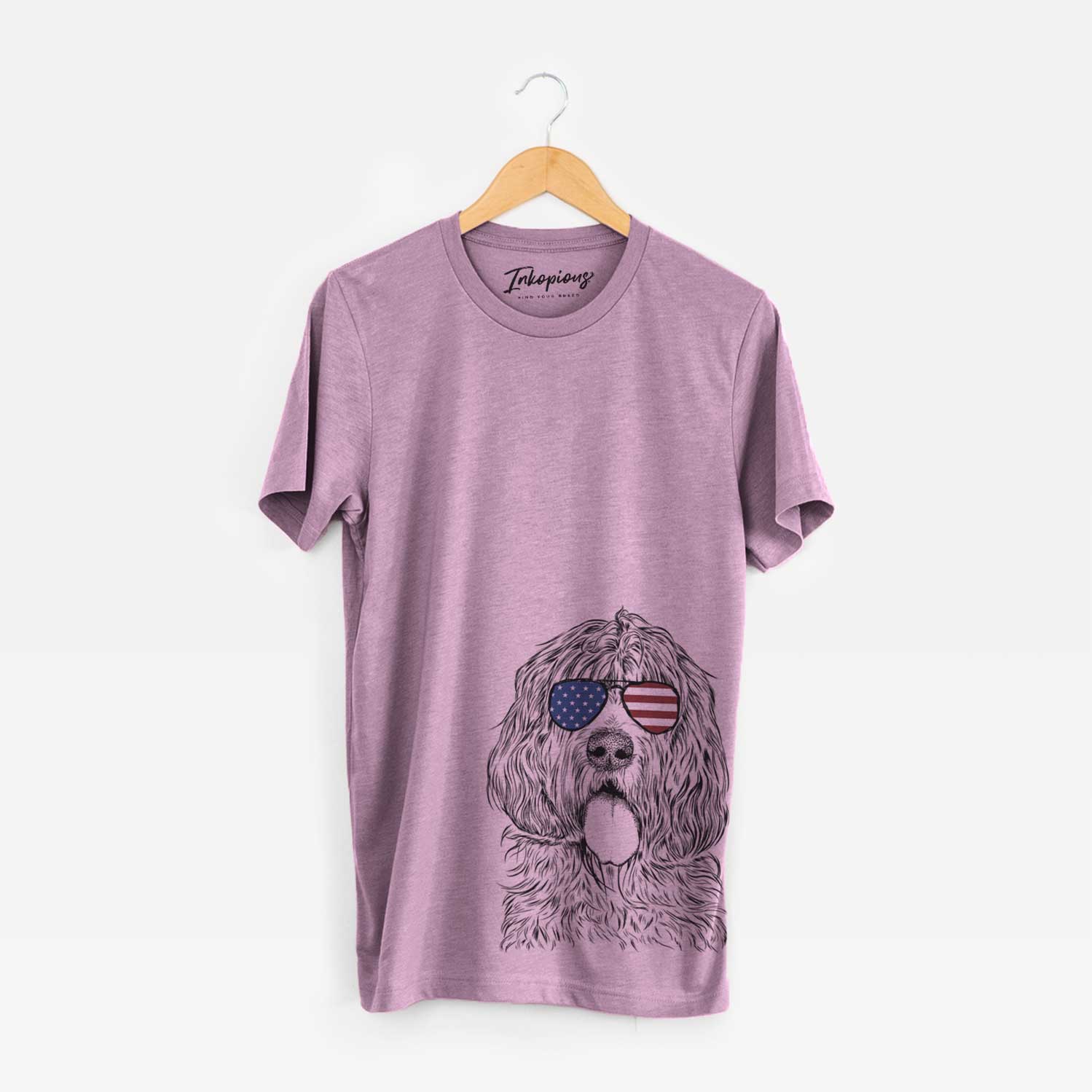 Hand-drawn sketch of Lou the Otterhound wearing American flag sunglasses on an Orchid Unisex crewneck