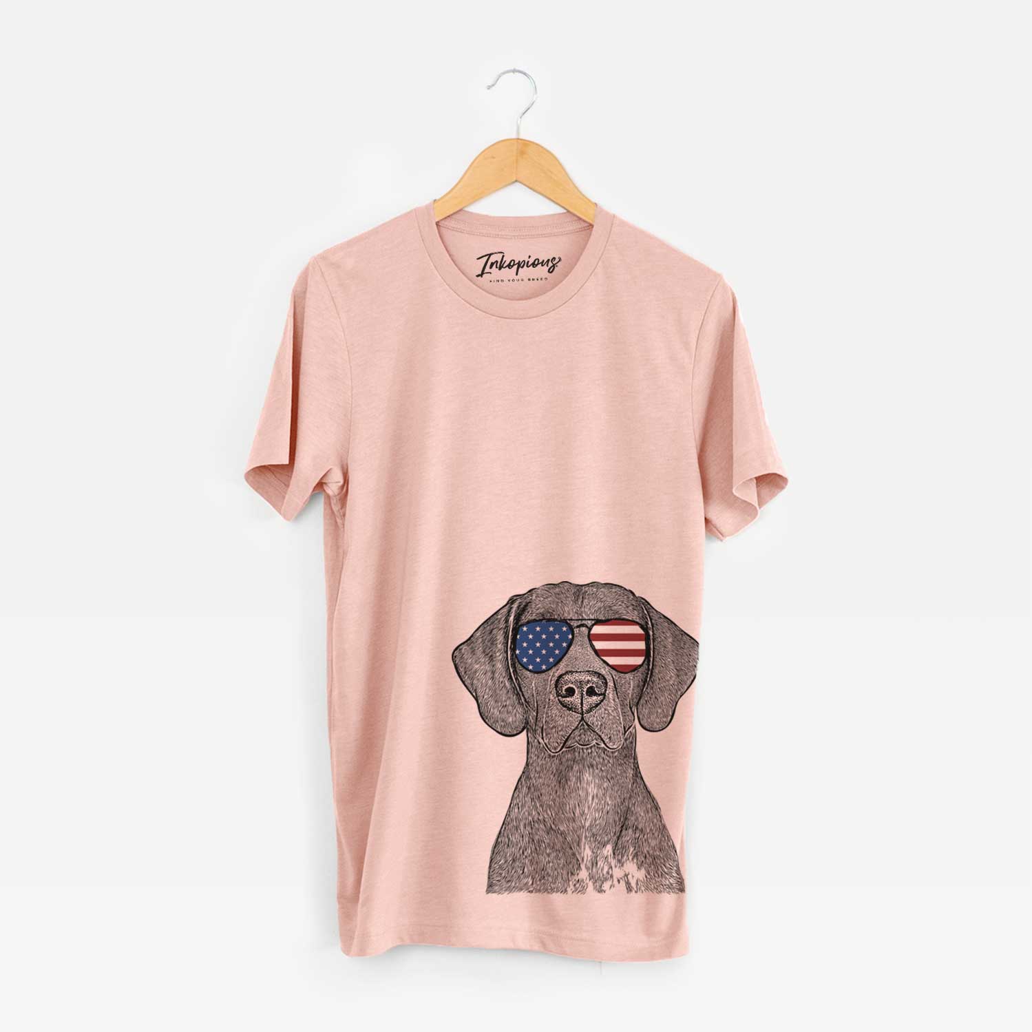 Hand-drawn sketch of Lucifer the German Shorthaired Pointer wearing American flag sunglasses on a Peach Unisex crewneck