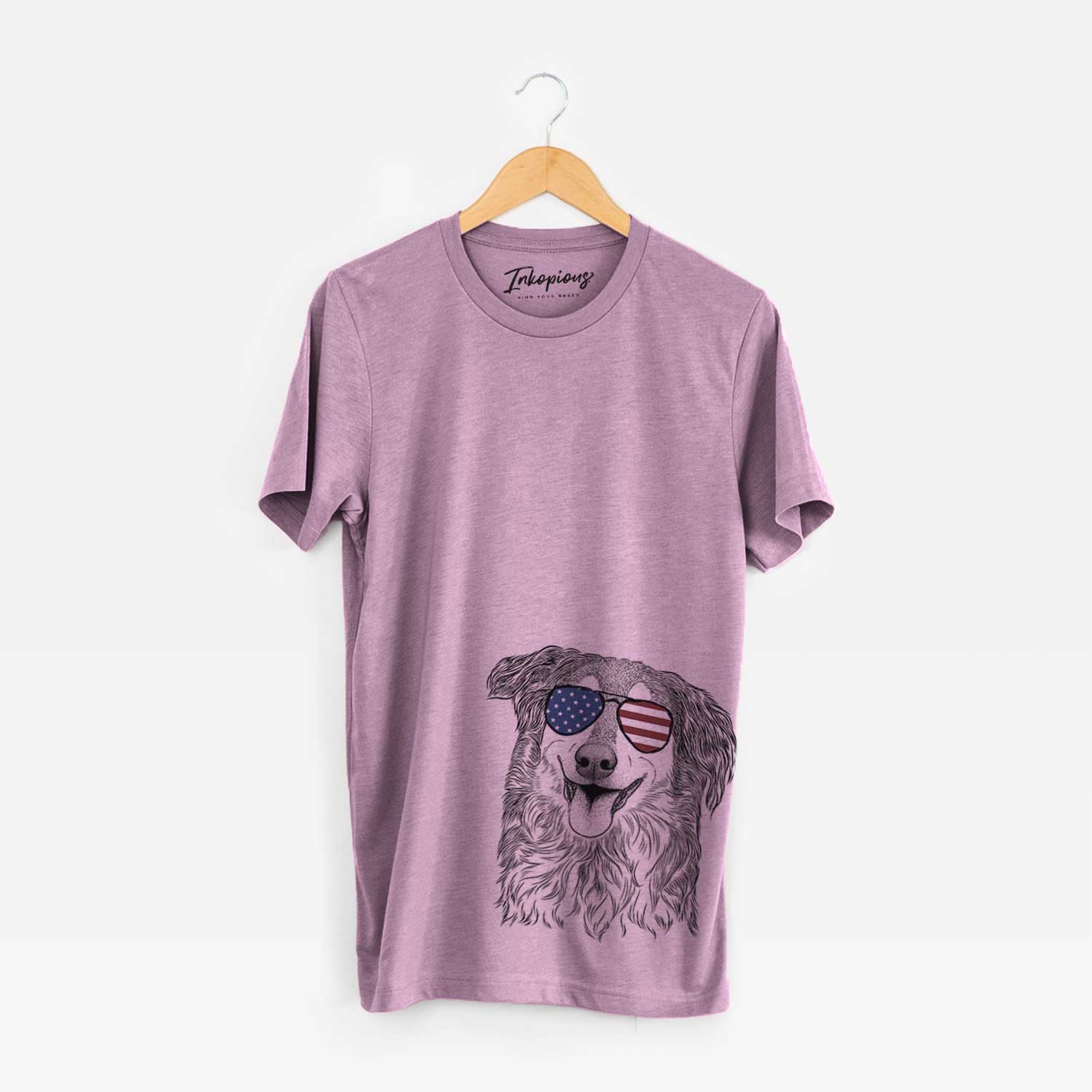 Hand-drawn sketch of Maddie the English Shepherd wearing American flag sunglasses on an Orchid Unisex crewneck