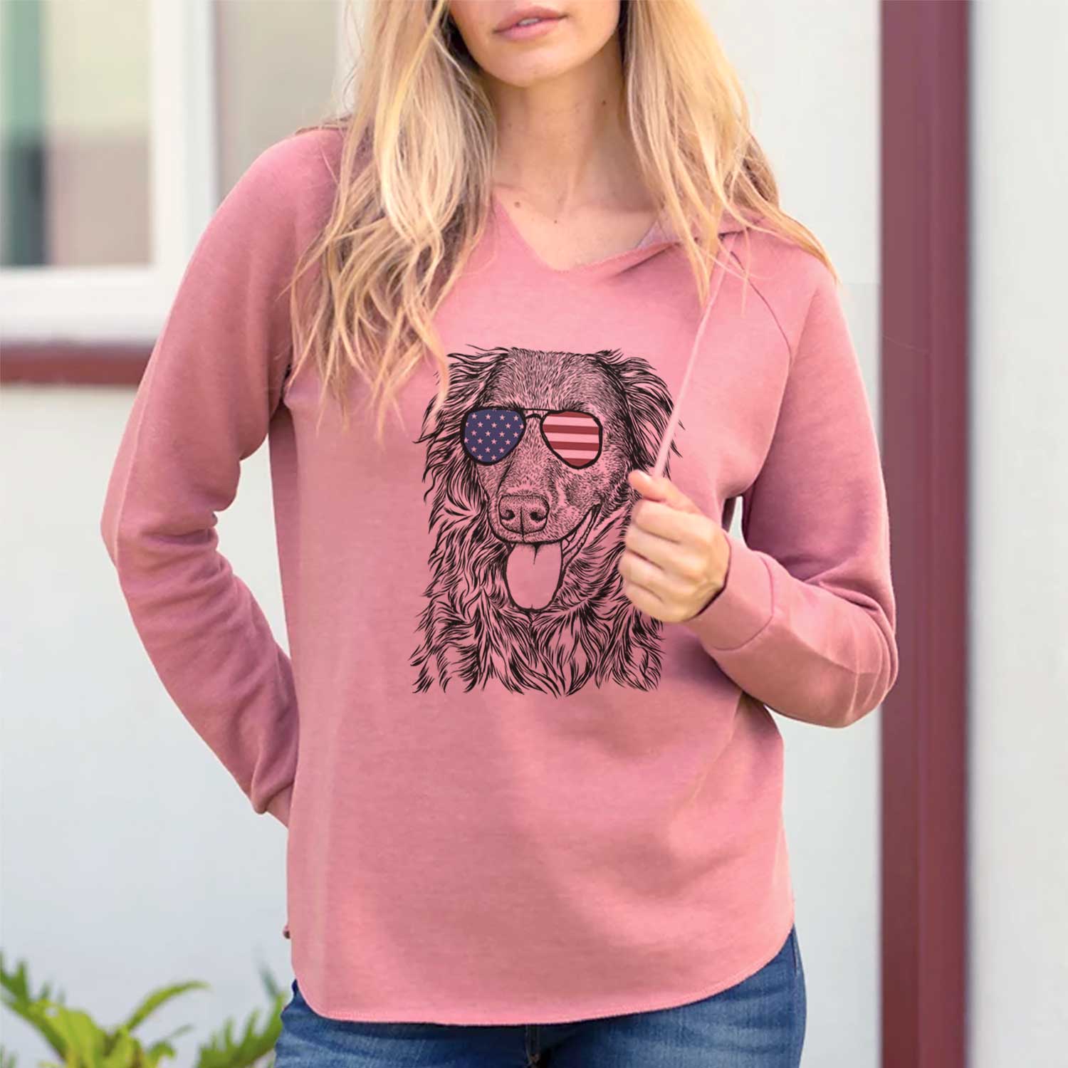 Hand-drawn sketch of Maisie Mae the Aussiedor wearing American flag sunglasses on a Dusty Rose Cali Wave Hooded Sweatshirt, lifestyle photo