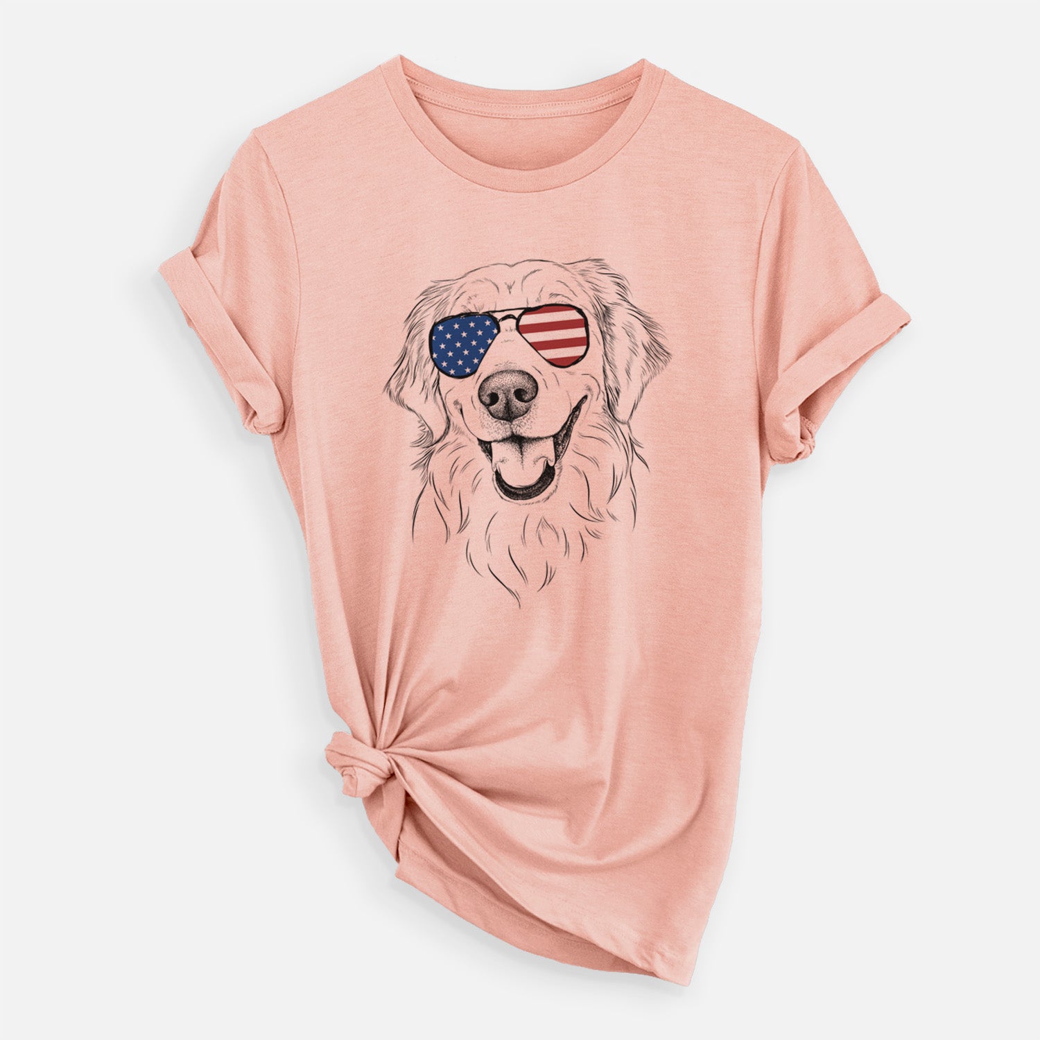 Hand-drawn sketch of Maple the Golden Retriever wearing American flag sunglasses on a Peach Unisex crewneck