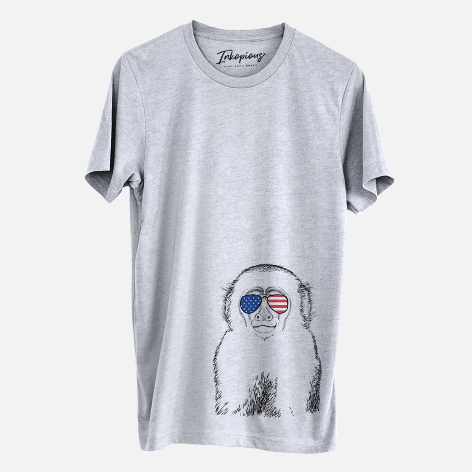 Hand-drawn sketch of Marcel the Capuchin Monkey wearing American flag sunglasses on a Grey Unisex crewneck
