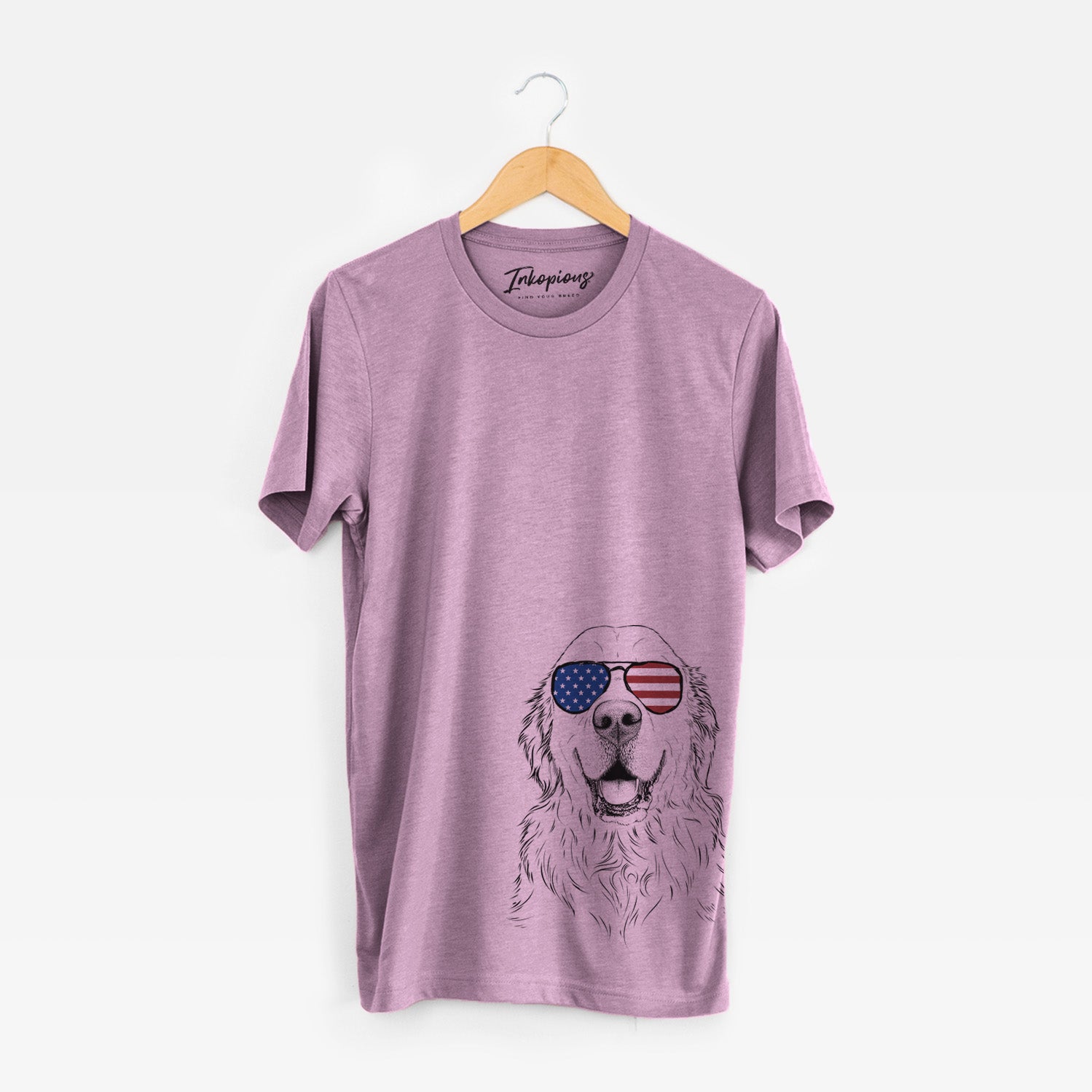 Hand-drawn sketch of Maximus the Golden Retriever wearing American flag sunglasses on an Orchid Unisex crewneck