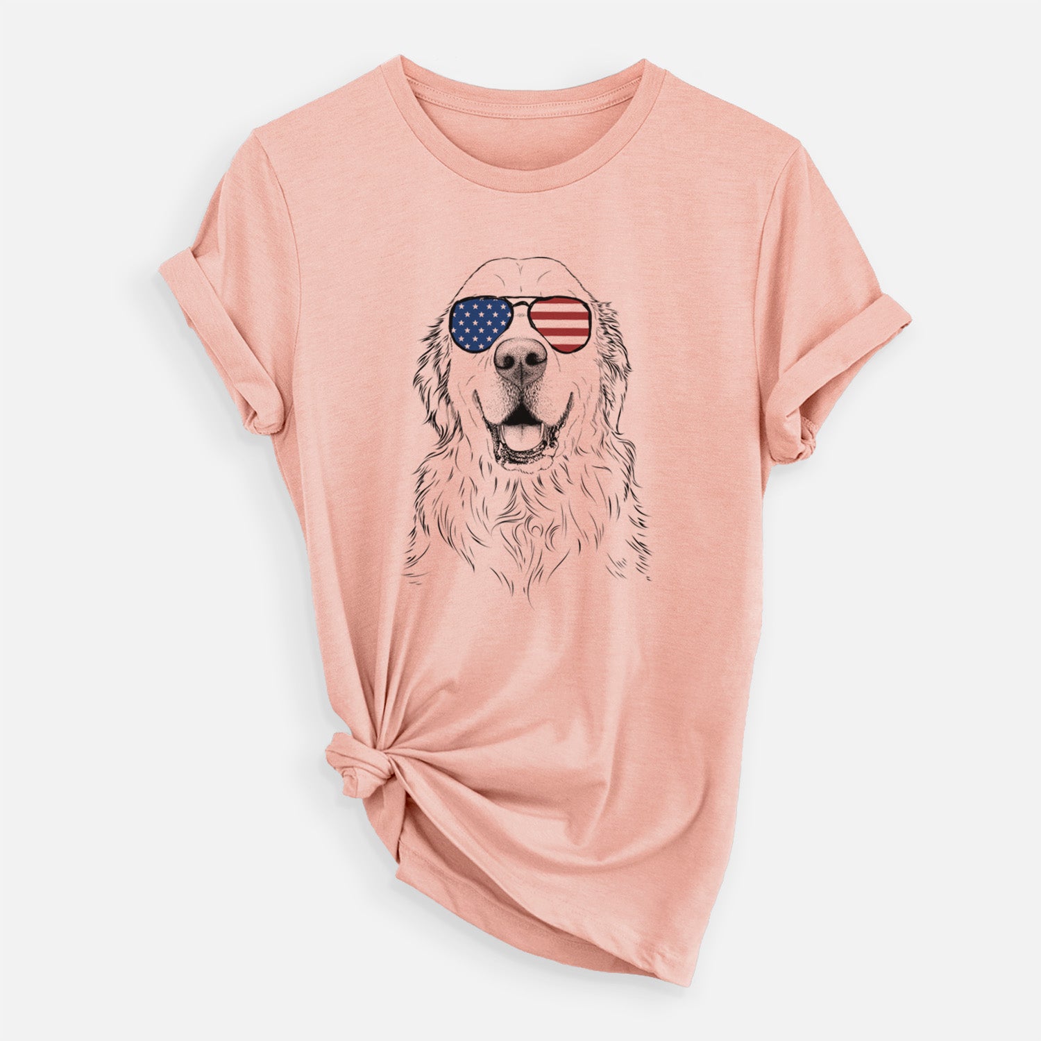 Hand-drawn sketch of Maximus the Golden Retriever wearing American flag sunglasses on a Peach Unisex crewneck