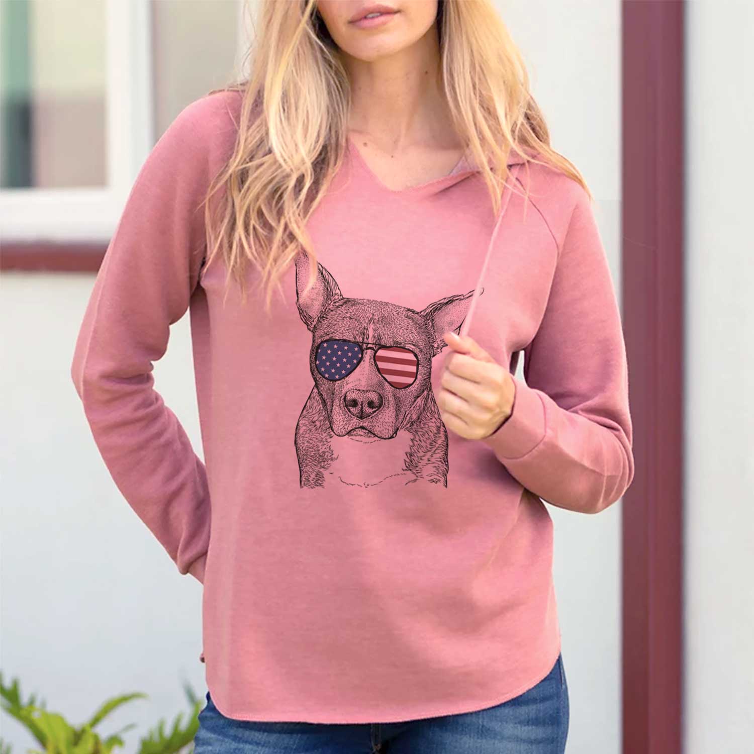 Hand-drawn sketch of Mercy the Pitbull wearing American flag sunglasses on a Dusty Rose Cali Wave Hooded Sweatshirt, lifestyle photo