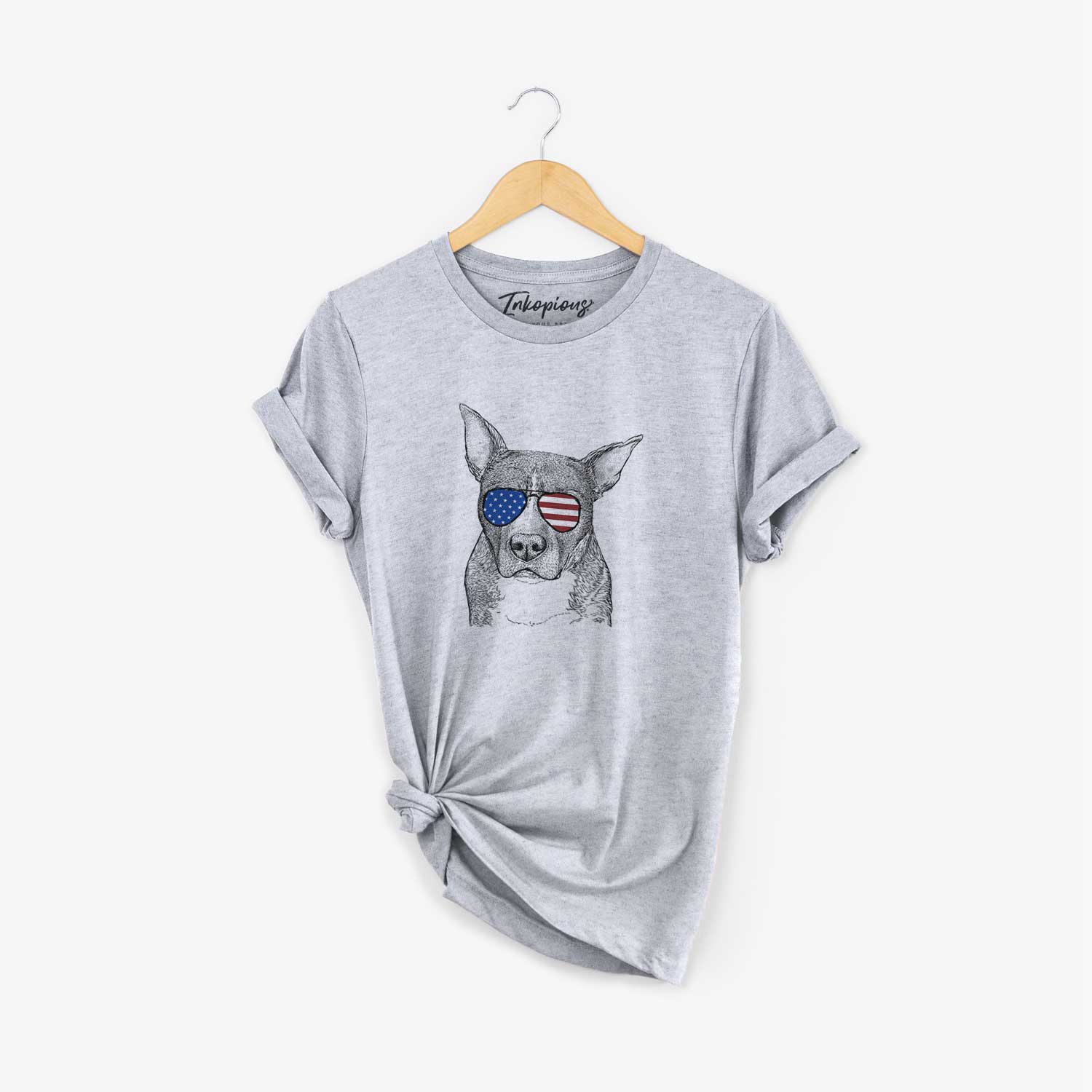 Hand-drawn sketch of Mercy the Pitbull wearing American flag sunglasses on a Grey Unisex crewneck