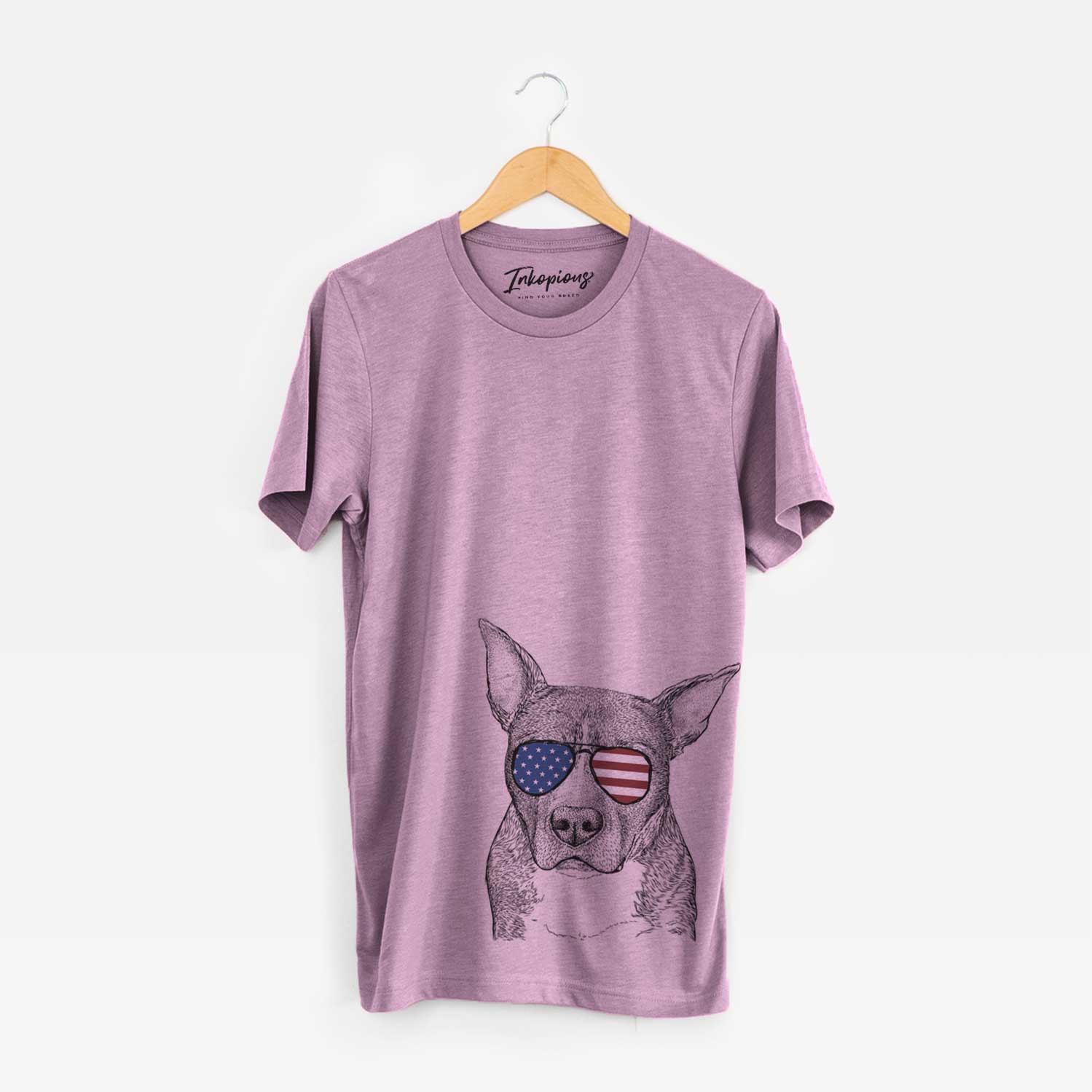 Hand-drawn sketch of Mercy the Pitbull wearing American flag sunglasses on an Orchid Unisex crewneck