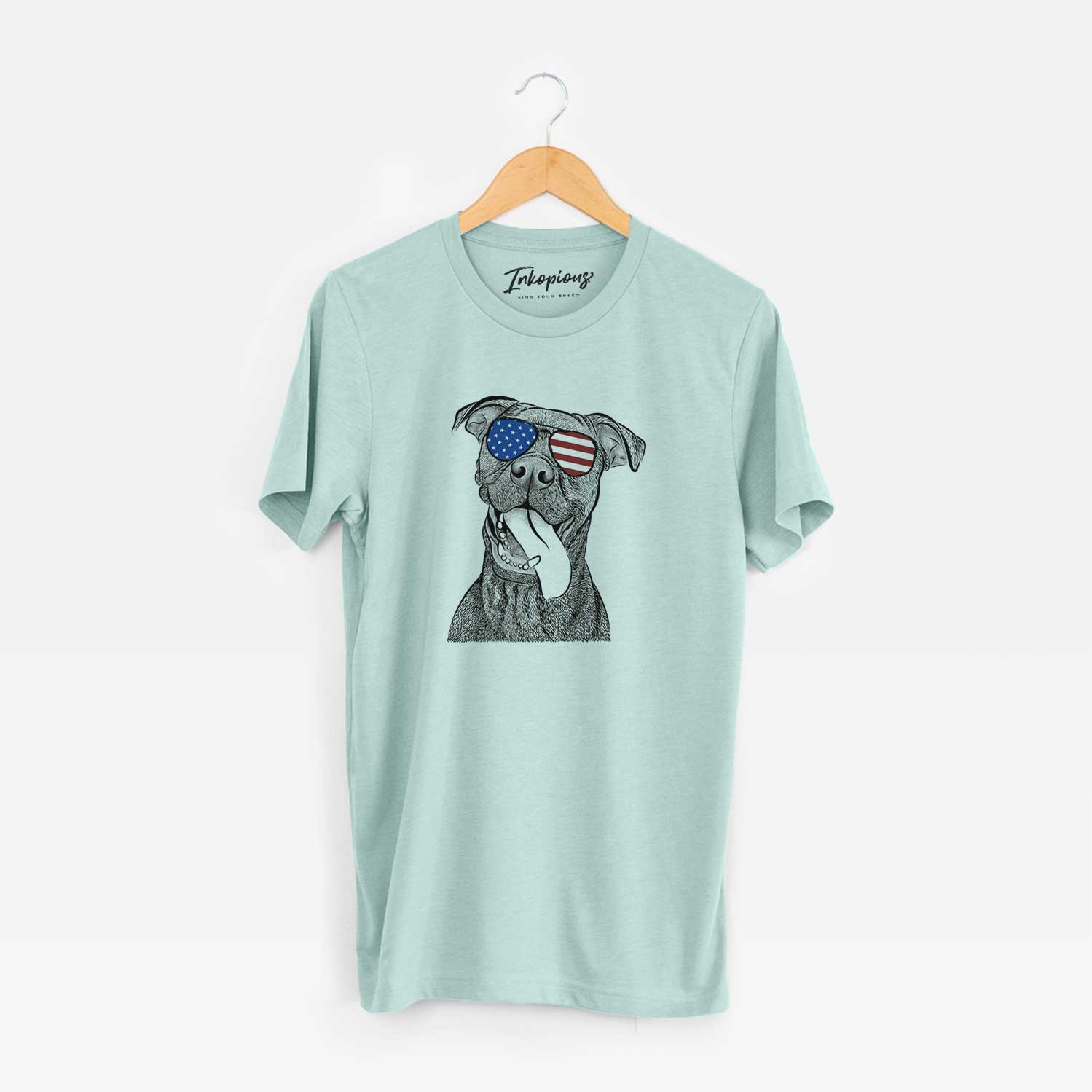 Hand-drawn sketch of Mikey the Boxador wearing American flag sunglasses on a Heather Sage Unisex crewneck