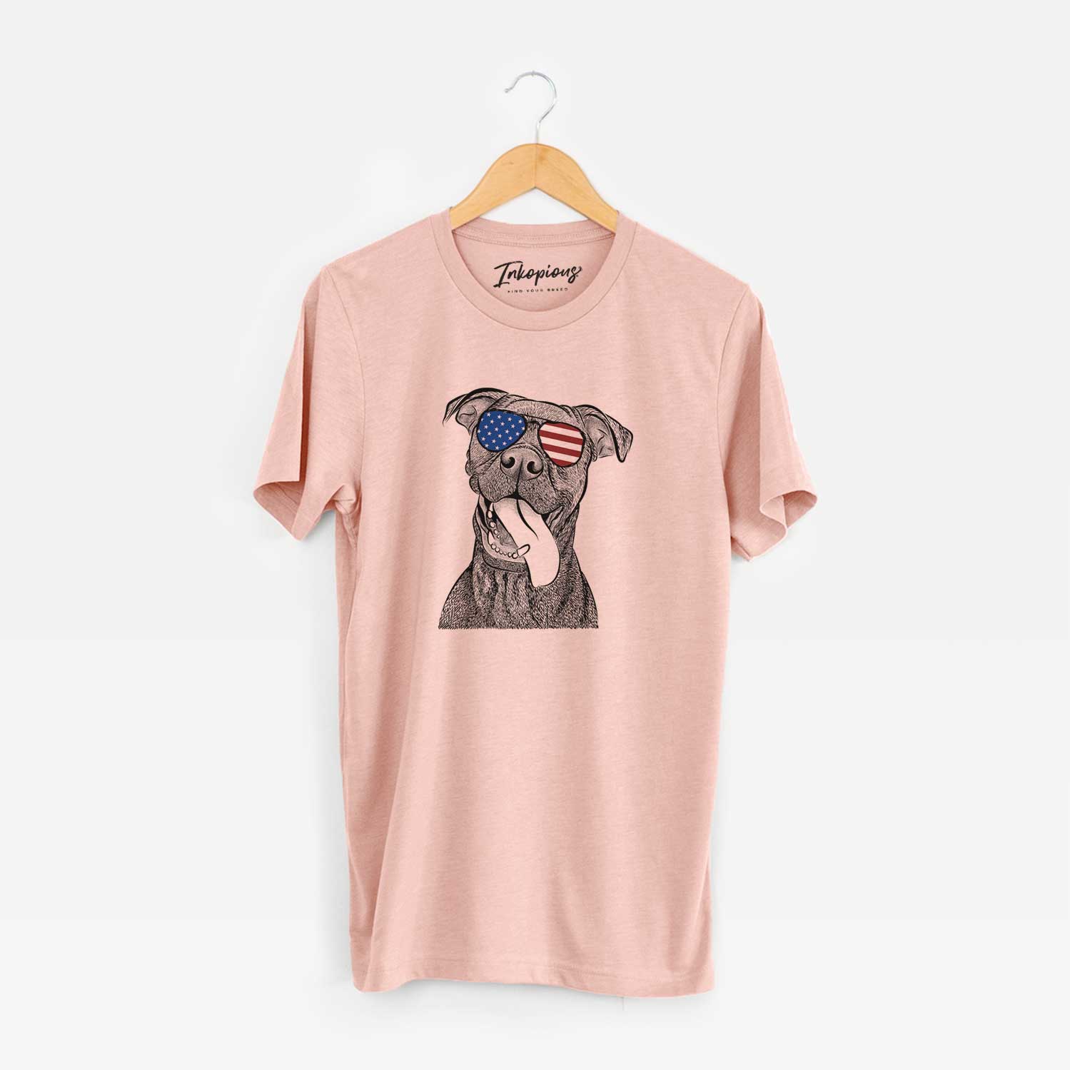 Hand-drawn sketch of Mikey the Boxador wearing American flag sunglasses on a Peach Unisex crewneck