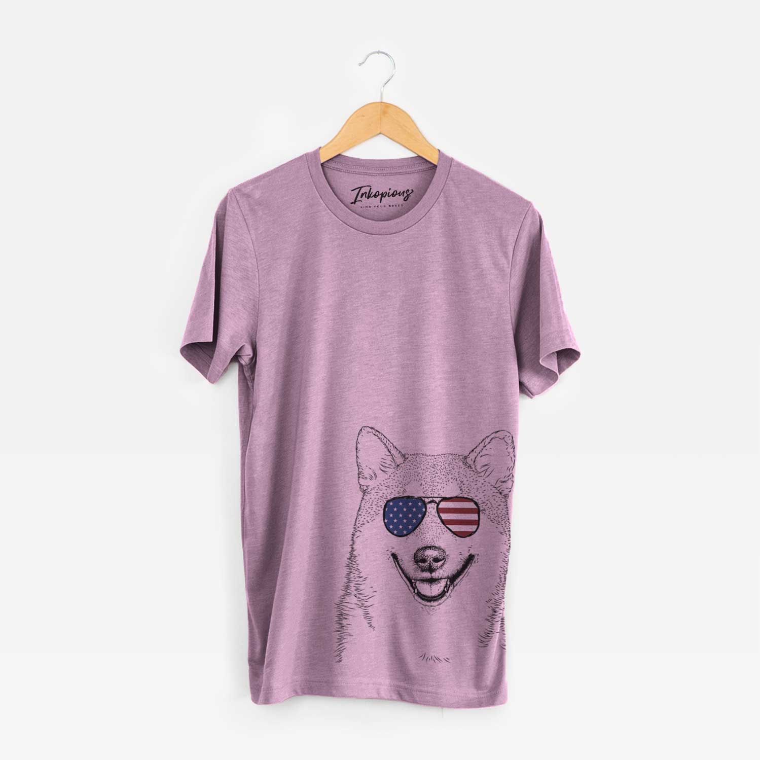 Hand-drawn sketch of Mitsu the Shiba Inu wearing American flag sunglasses on an Orchid Unisex crewneck