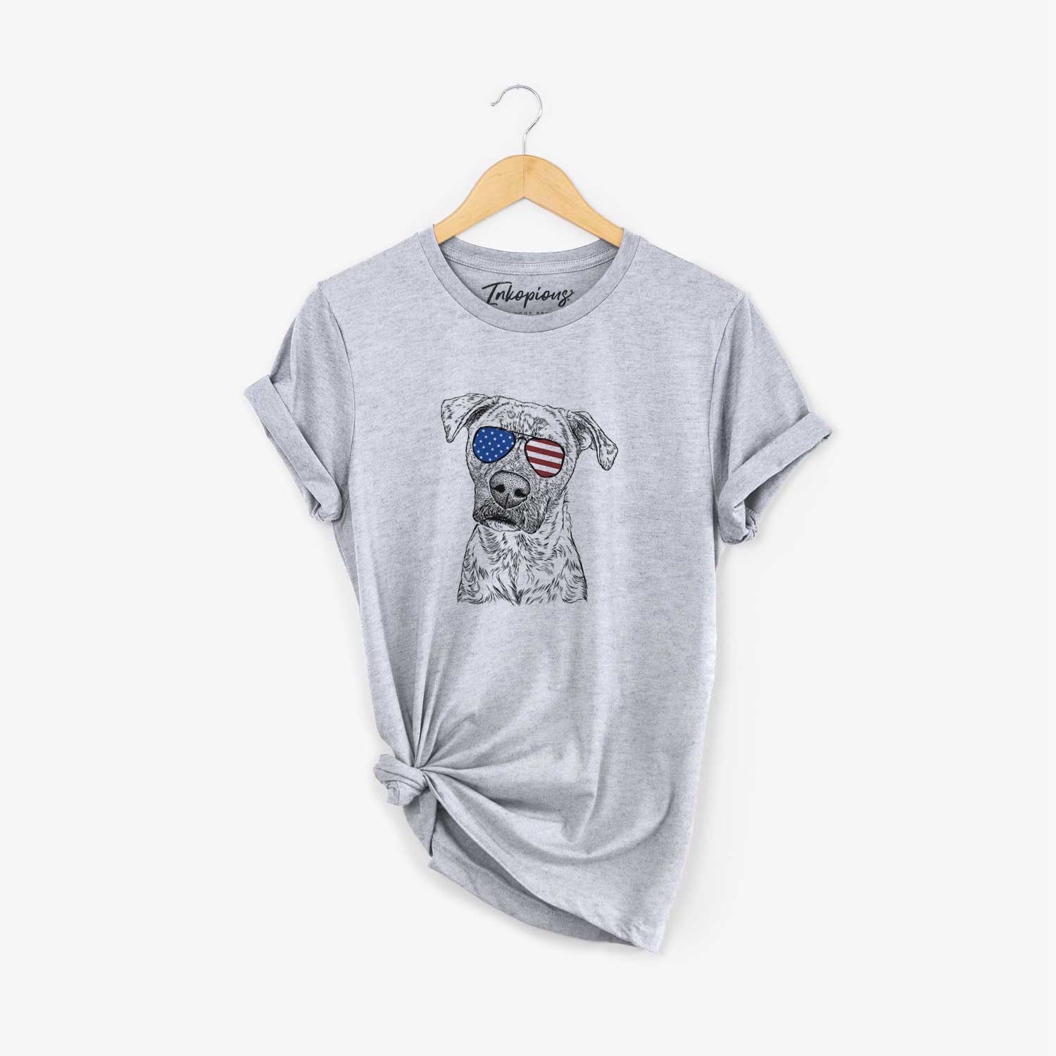 Hand-drawn sketch of Monster Baby the Pitbull Mix wearing American flag sunglasses on a Grey Unisex crewneck