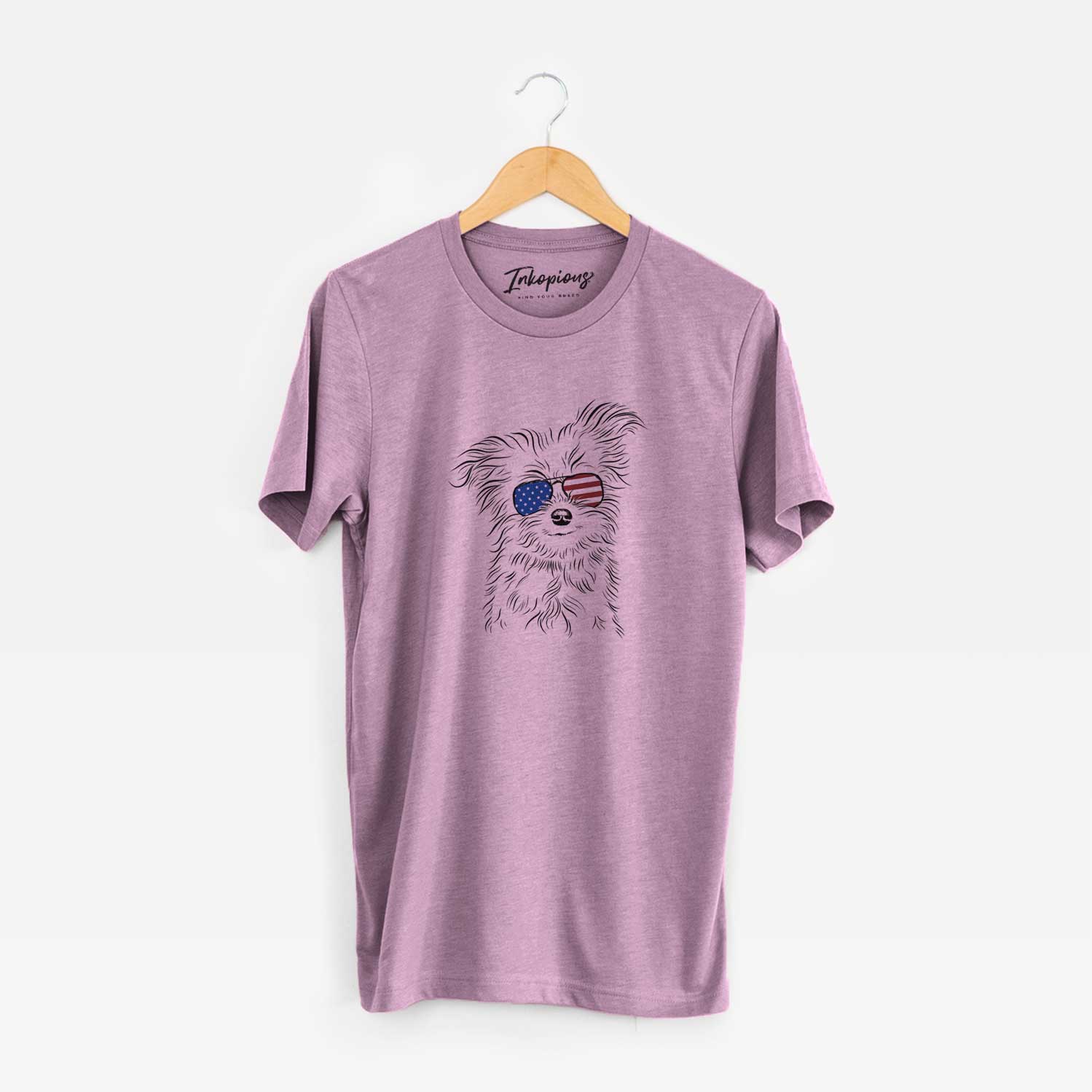 Hand-drawn sketch of Mr. Gucci Poochi the Maltese wearing American flag sunglasses on an Orchid Unisex crewneck