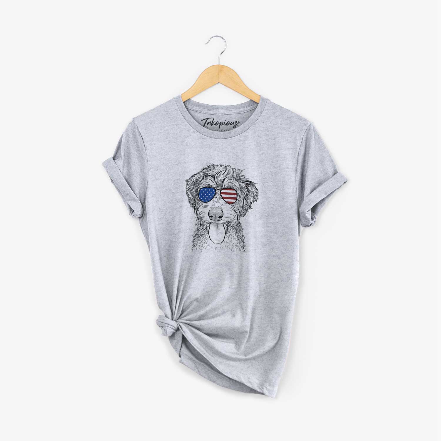Hand-drawn sketch of Myrtle Mae the Aussiedoodle wearing American flag sunglasses on a Grey Unisex crewneck