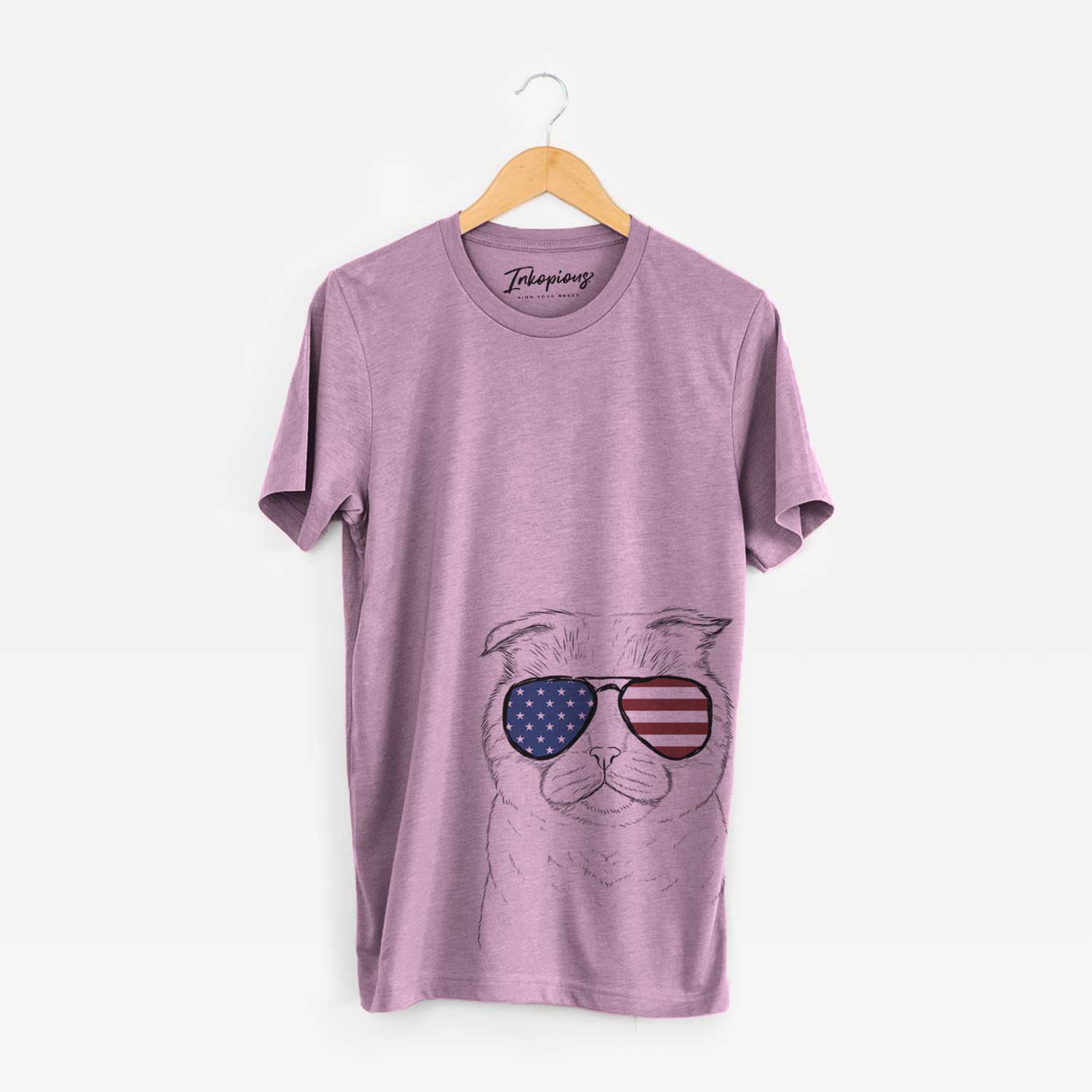 Hand-drawn sketch of Neko the Scottish Fold Cat wearing American flag sunglasses on an Orchid Unisex crewneck