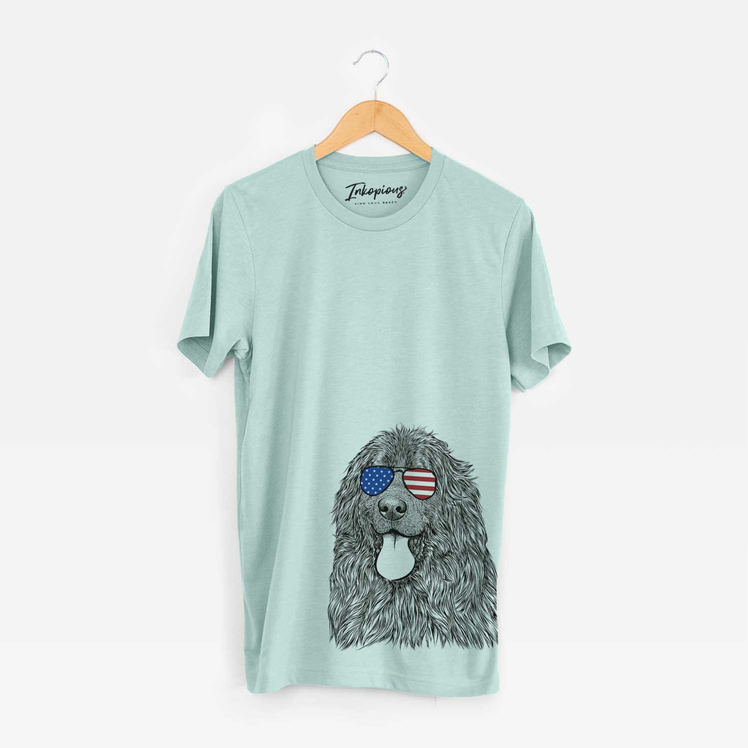 Hand-drawn sketch of Neptune the Newfoundland wearing American flag sunglasses on a Heather Sage Unisex crewneck