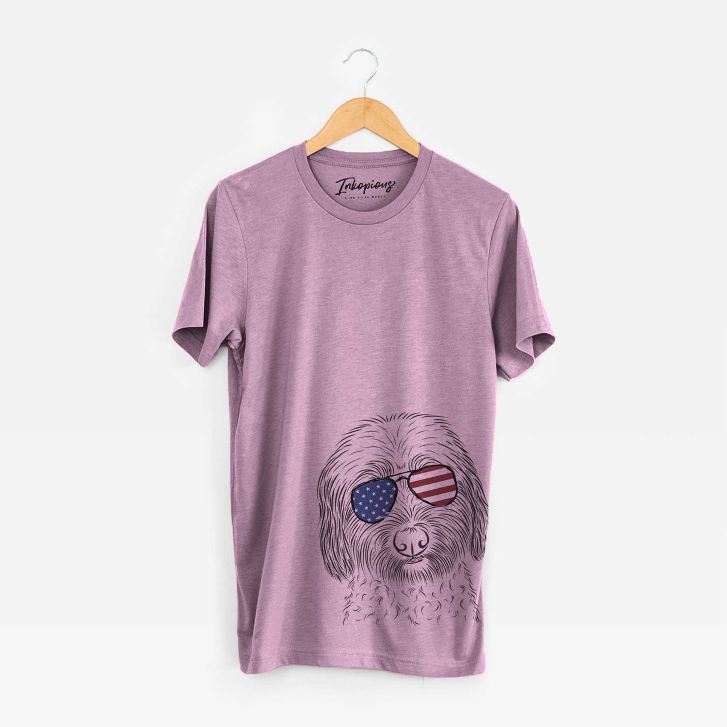 Hand-drawn sketch of Niles the Soft Coated Wheaten Terrier wearing American flag sunglasses on an Orchid Unisex crewneck