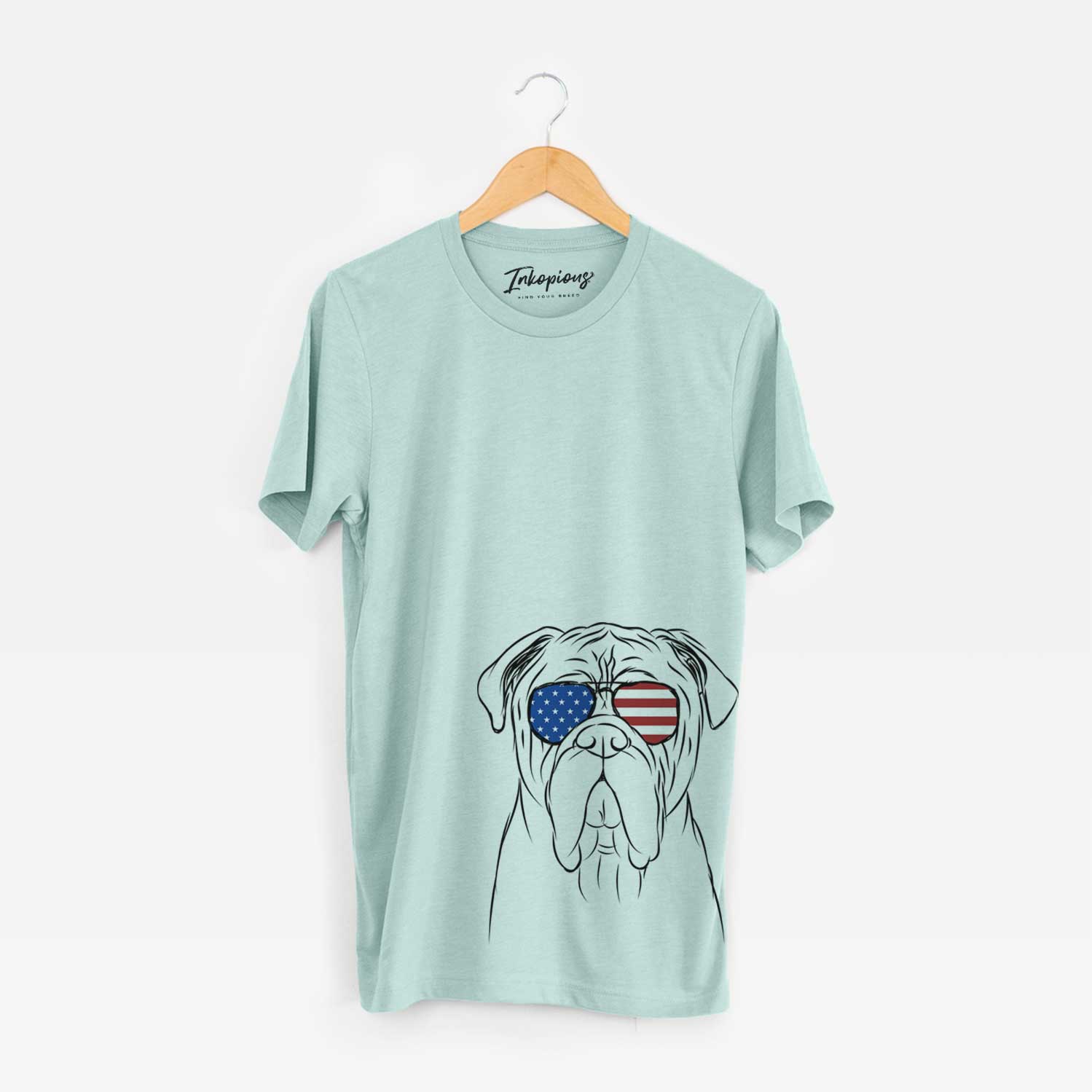Hand-drawn sketch of Nolan the Bull Mastiff wearing American flag sunglasses on a Heather Sage Unisex crewneck