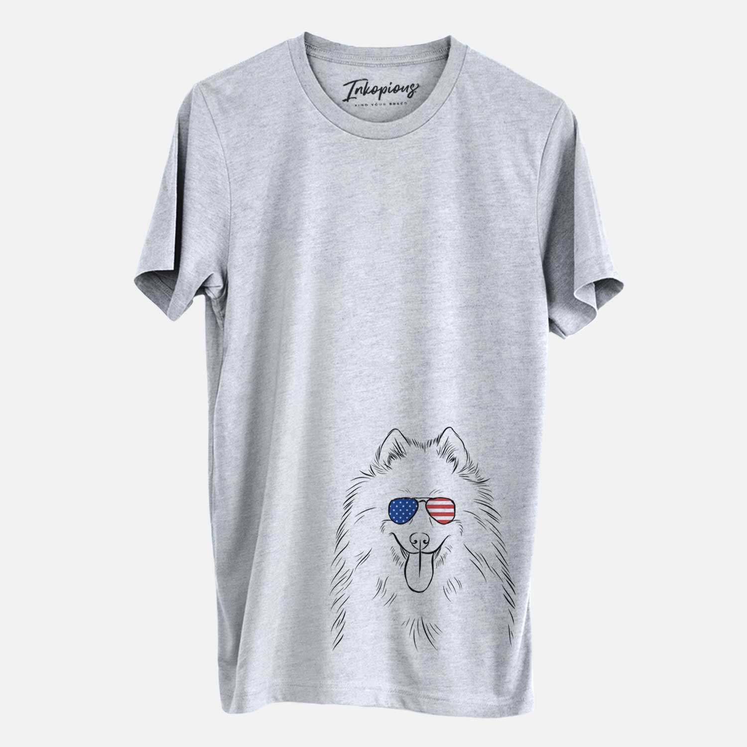 Hand-drawn sketch of Nova the Samoyed wearing American flag sunglasses on a Grey Unisex crewneck