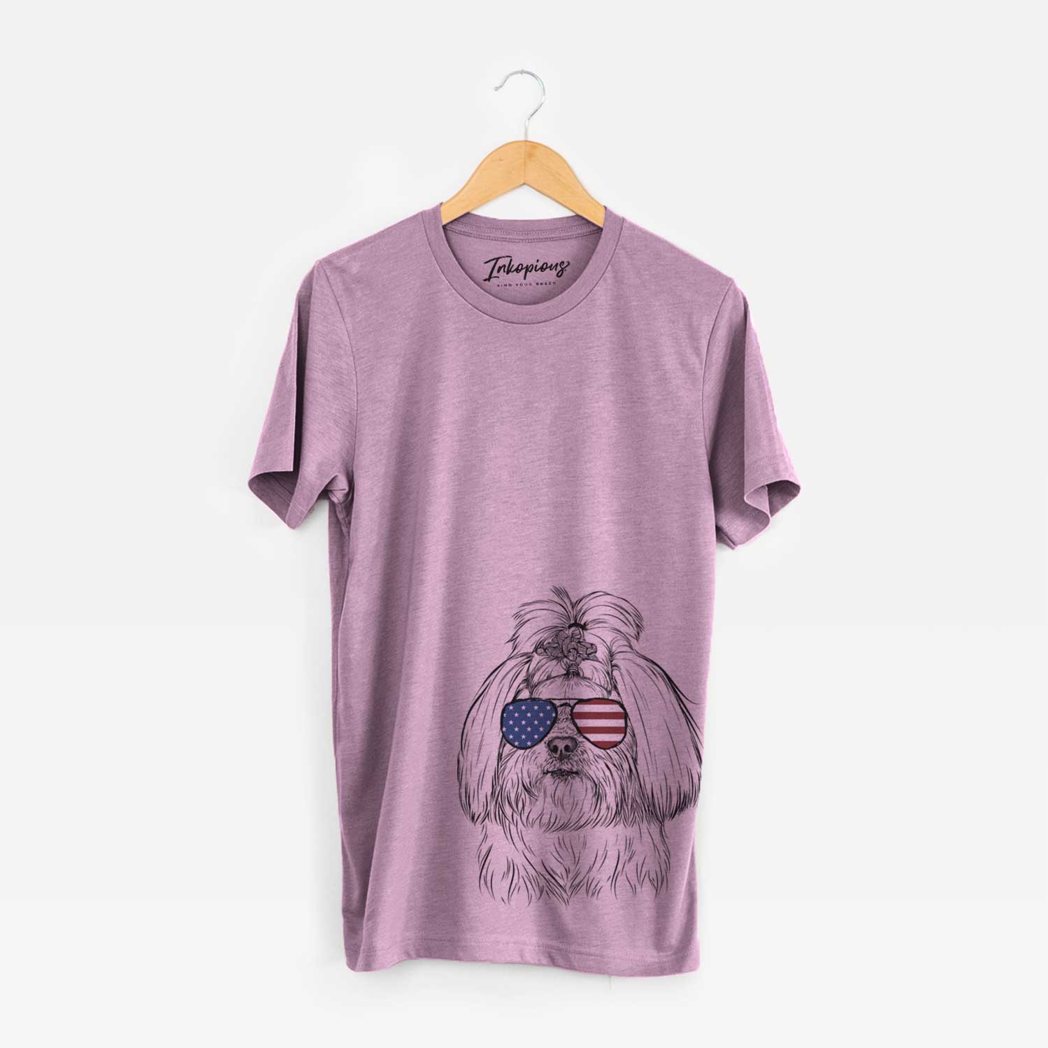 Hand-drawn sketch of Olga the Shih Tzu wearing American flag sunglasses on an Orchid Unisex crewneck