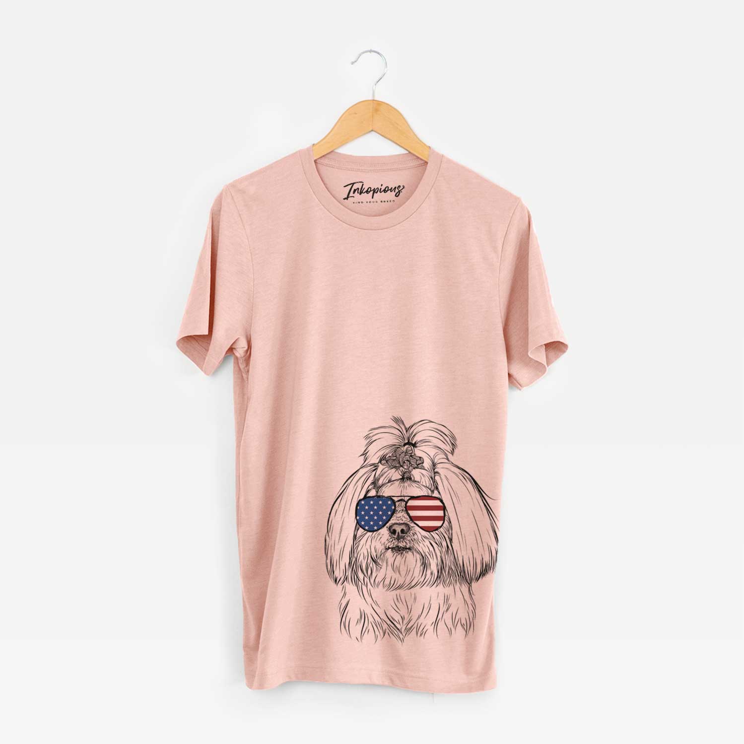 Hand-drawn sketch of Olga the Shih Tzu wearing American flag sunglasses on a Peach Unisex crewneck