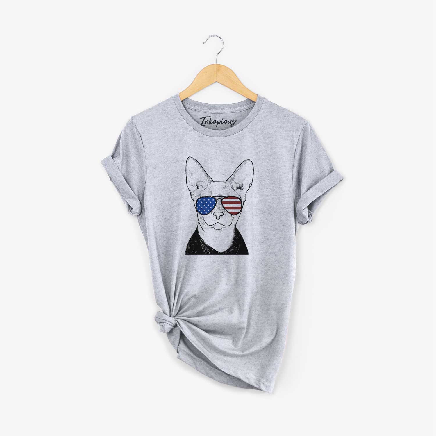 Hand-drawn sketch of Oliver Watson the Sphynx Cat wearing American flag sunglasses on a Grey Unisex crewneck