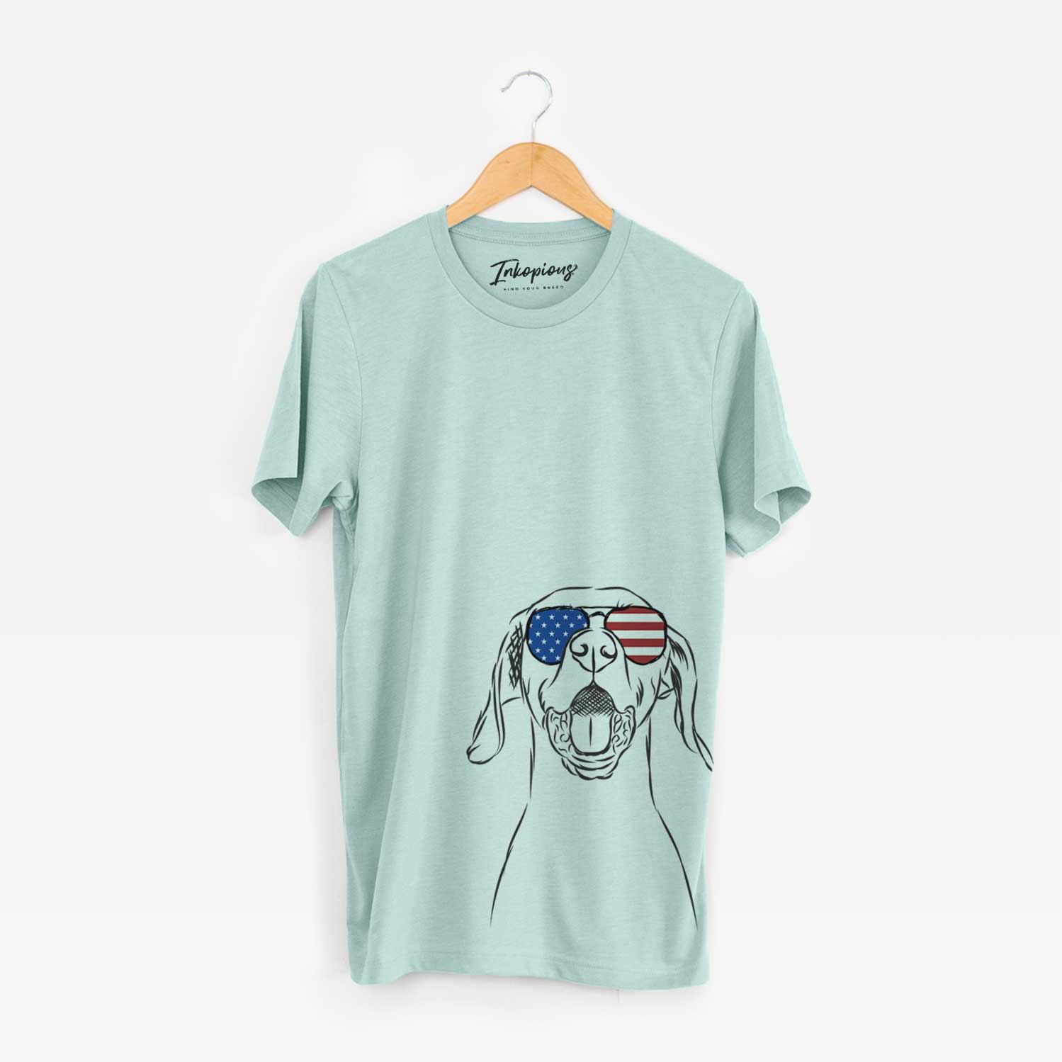 Hand-drawn sketch of Ollie the Vizsla wearing American flag sunglasses on a Heather Sage Unisex crewneck