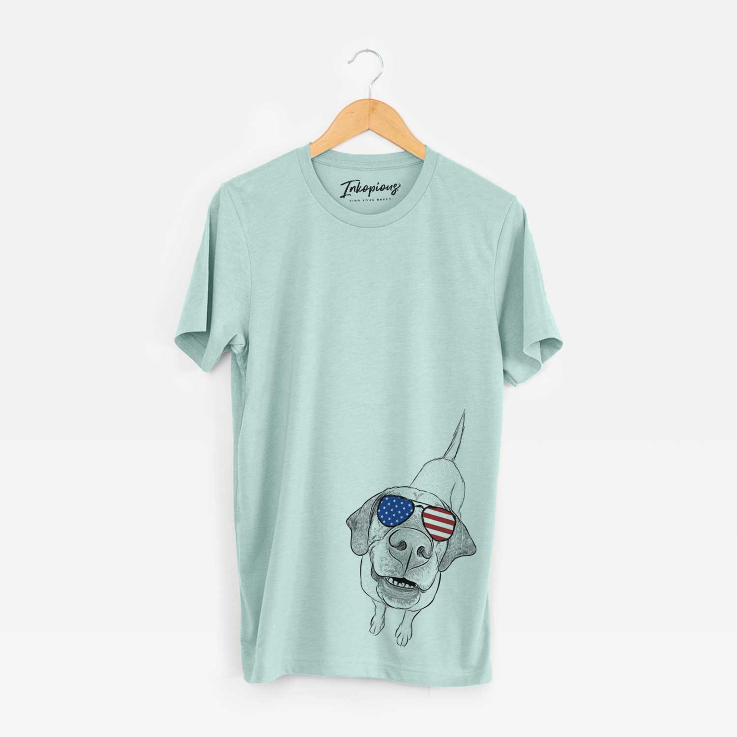 Hand-drawn sketch of Oquirrh the Vizsla wearing American flag sunglasses on a Heather Sage Unisex crewneck