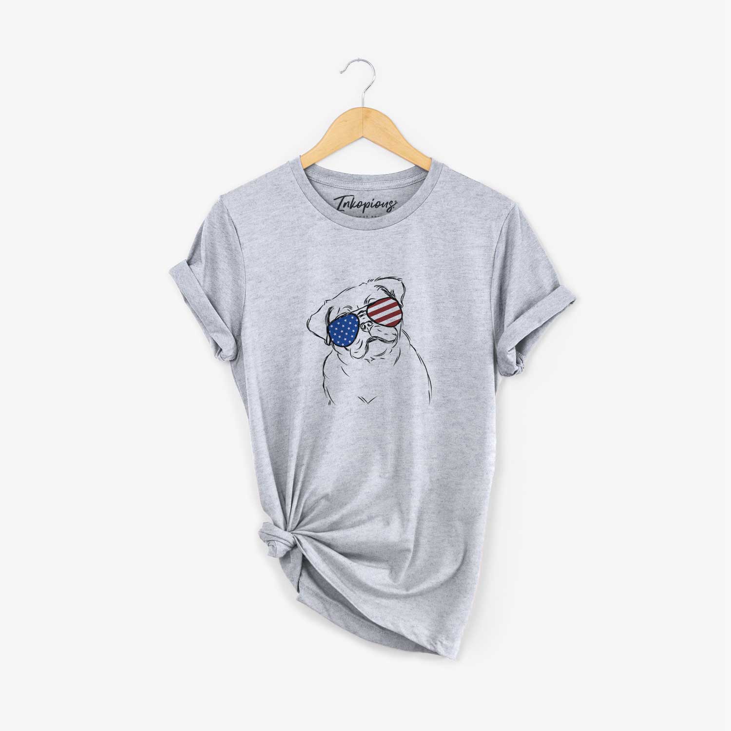 Hand-drawn sketch of Otis the Pug wearing American flag sunglasses on a Grey Unisex crewneck