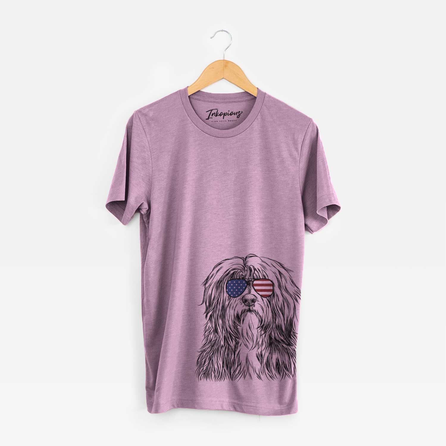Hand-drawn sketch of Otto the Polish Lowland Sheepdog wearing American flag sunglasses on an Orchid Unisex crewneck