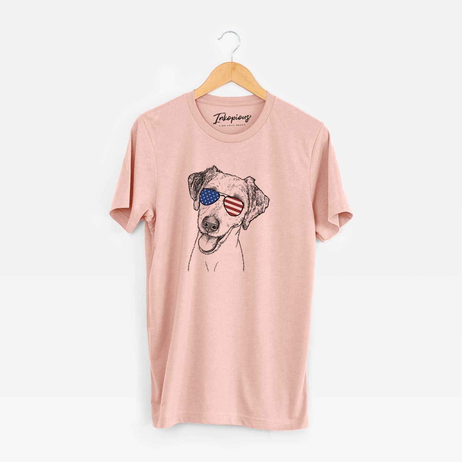 Hand-drawn sketch of Palm Palm the Aussiedoodle wearing American flag sunglasses on a Peach Unisex crewneck