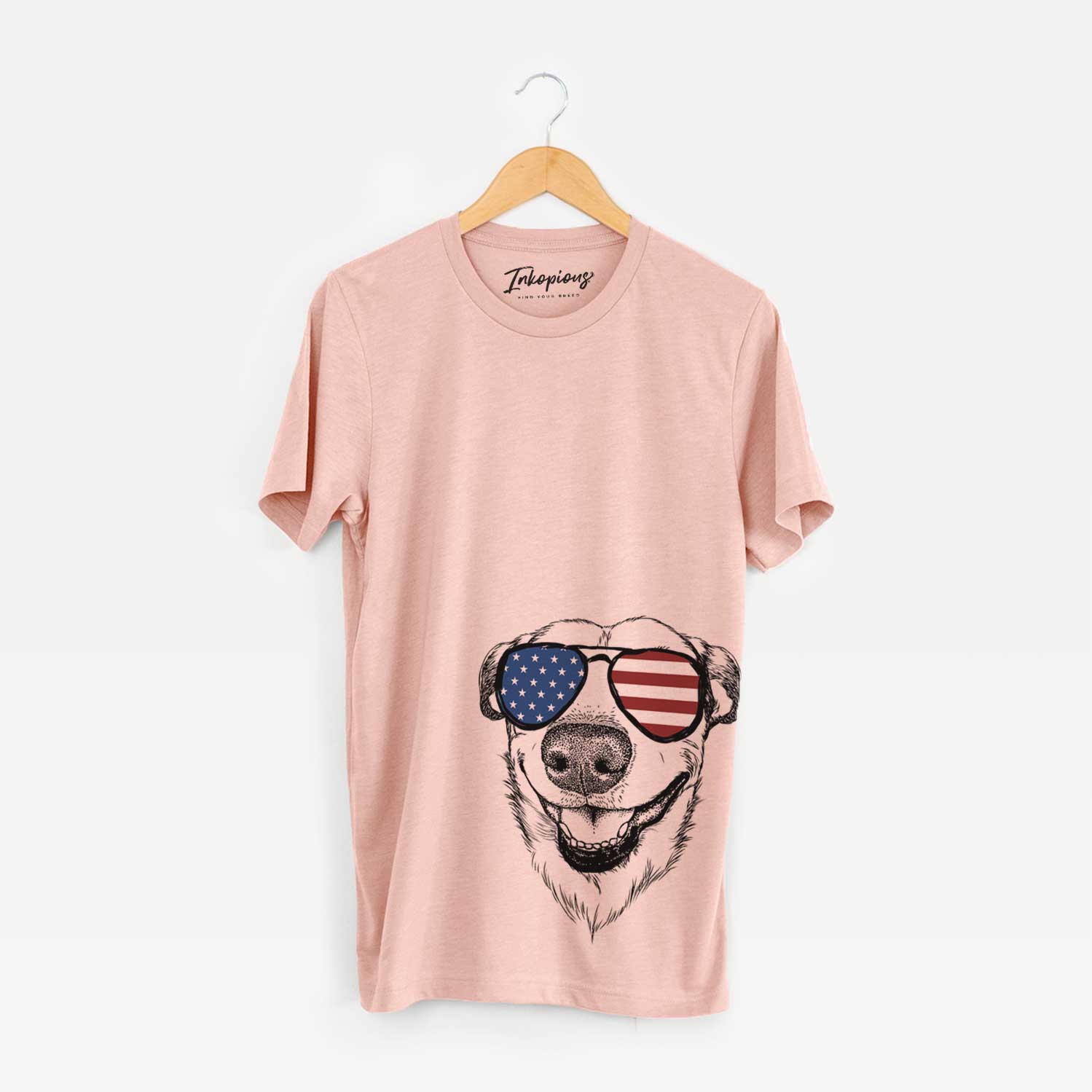 Hand-drawn sketch of Petrah the Staffy Mix wearing American flag sunglasses on a Peach Unisex crewneck