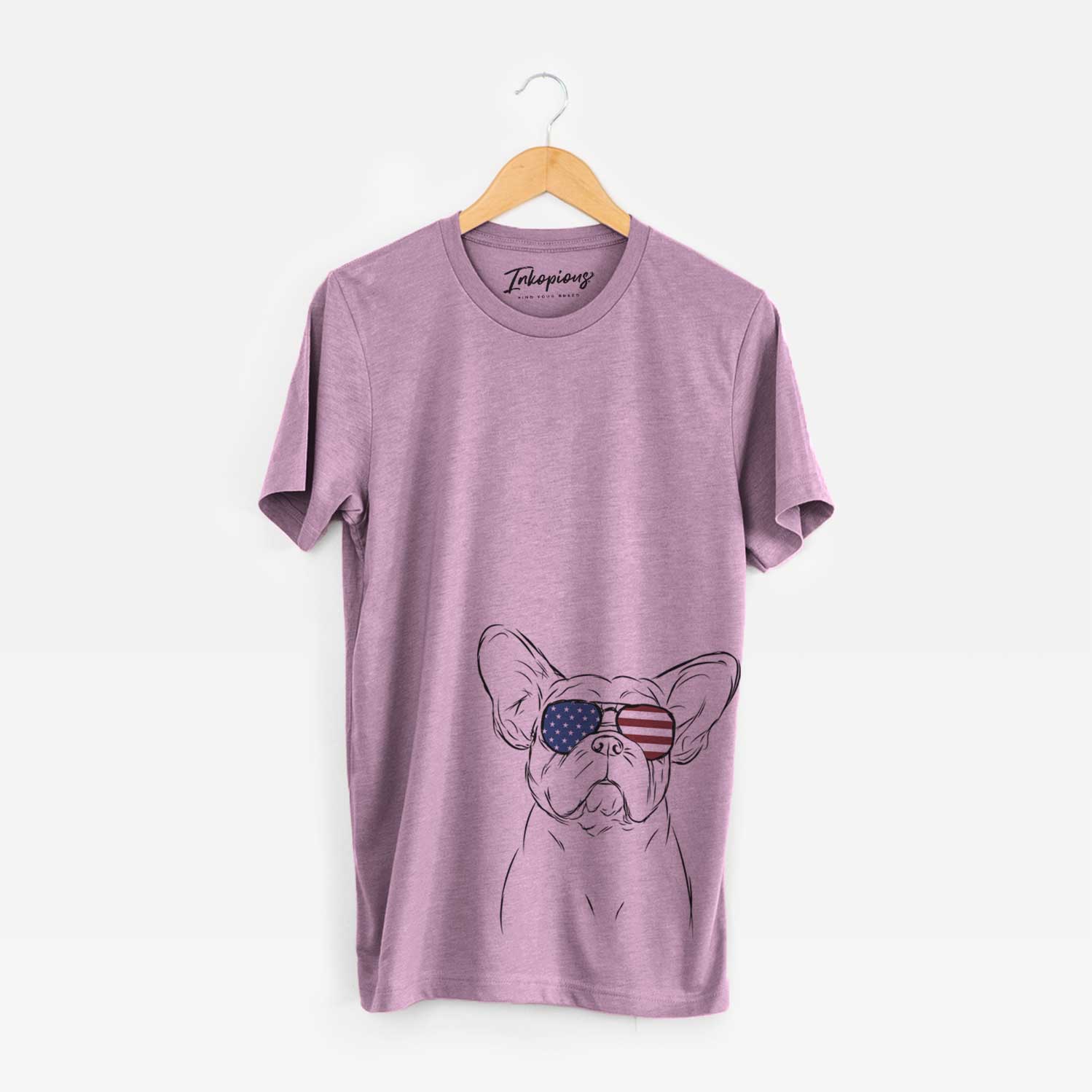 Hand-drawn sketch of Pierre the French Bulldog wearing American flag sunglasses on an Orchid Unisex crewneck