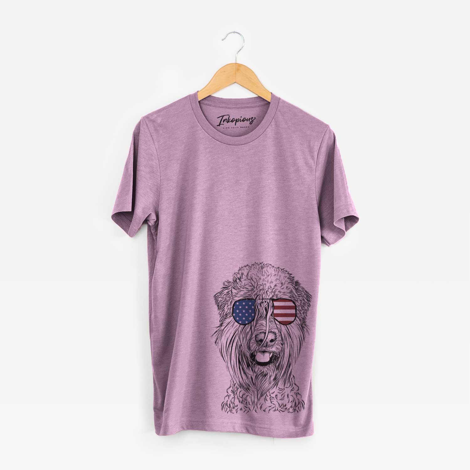 Hand-drawn sketch of Pierre the Soft Coated Wheaten Terrier wearing American flag sunglasses on an Orchid Unisex crewneck