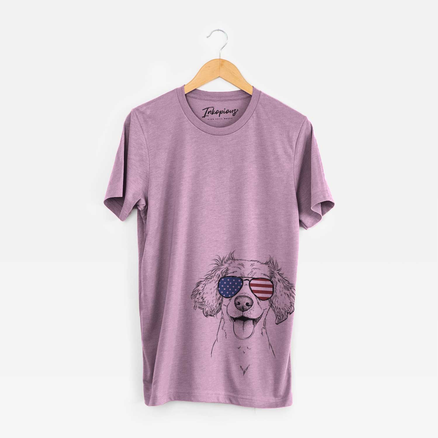 Hand-drawn sketch of Piglet the Dachshund Mix wearing American flag sunglasses on an Orchid Unisex crewneck