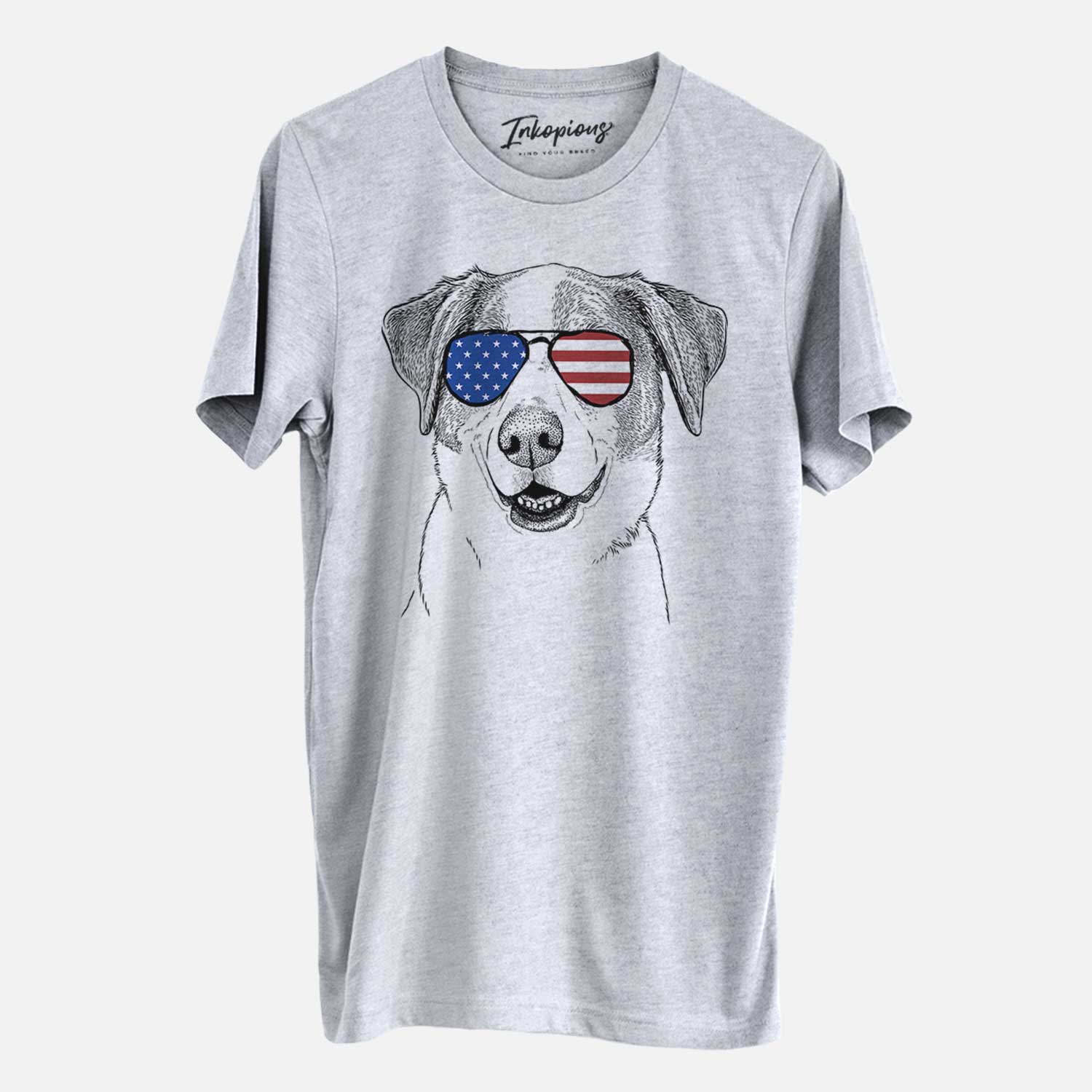 Hand-drawn sketch of Piper Pilot the Hound Mix wearing American flag sunglasses on a Grey Unisex crewneck