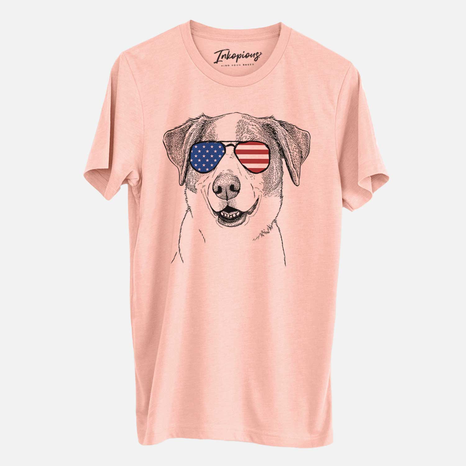 Hand-drawn sketch of Piper Pilot the Hound Mix wearing American flag sunglasses on a Peach Unisex crewneck