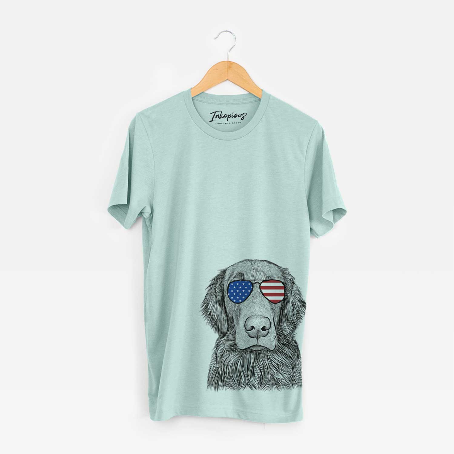 Hand-drawn sketch of Pippin the Flat Coated Retriever wearing American flag sunglasses on a Heather Sage Unisex crewneck