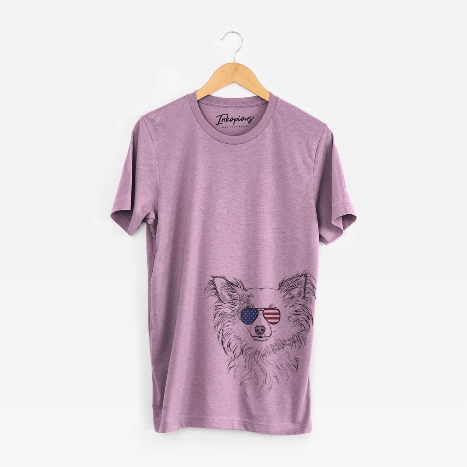 Hand-drawn sketch of Princess Ava the Long Haired Chihuahua wearing American flag sunglasses on an Orchid Unisex crewneck