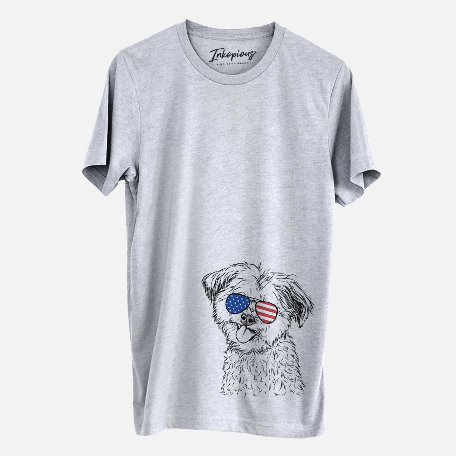 Hand-drawn sketch of Puff the Malshi wearing American flag sunglasses on a Grey Unisex crewneck