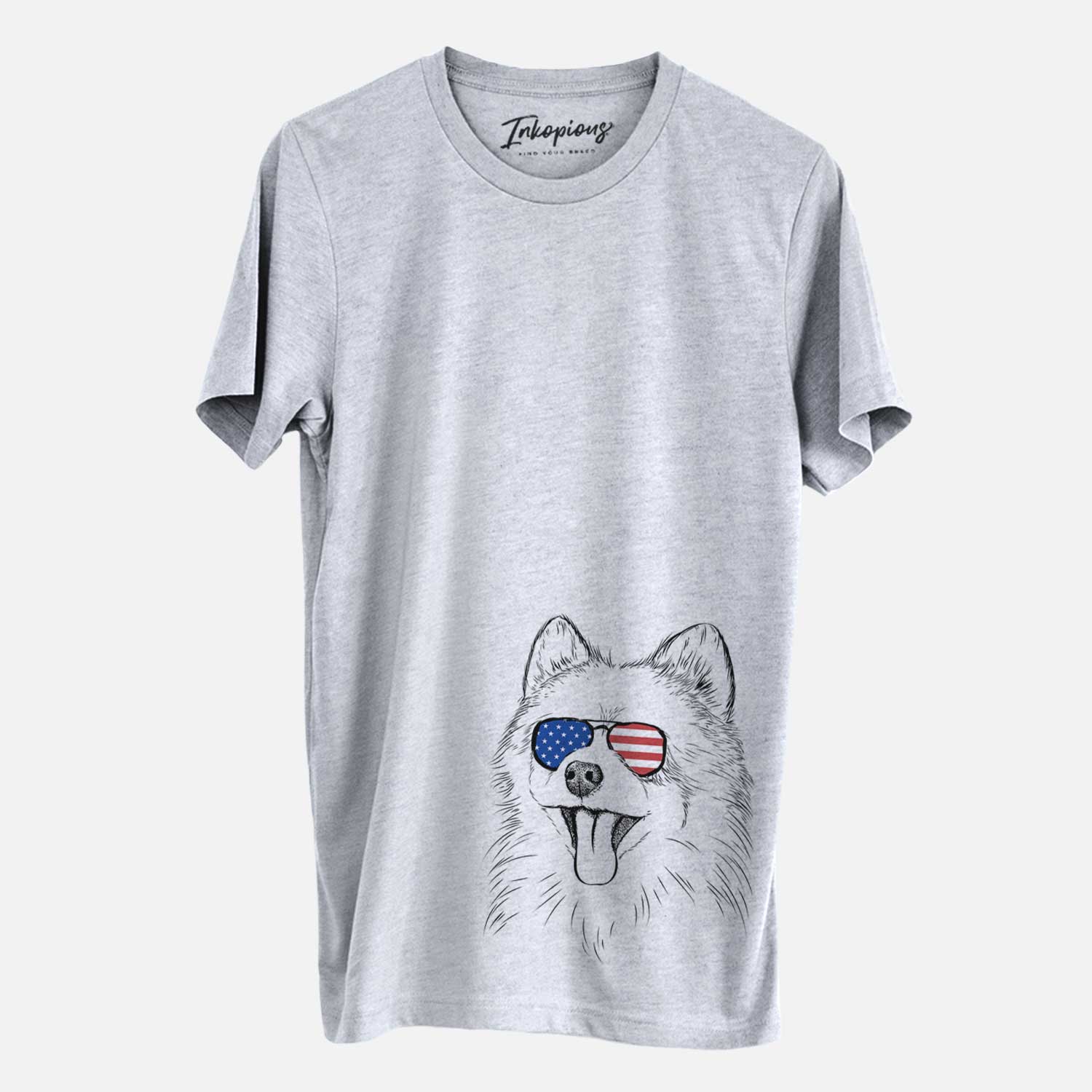 Hand-drawn sketch of Quinn the Pomeranian wearing American flag sunglasses on a Grey Unisex crewneck