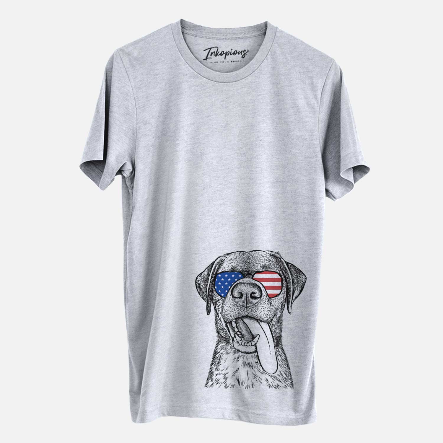 Hand-drawn sketch of Reese the Mixed Breed wearing American flag sunglasses on a Grey Unisex crewneck