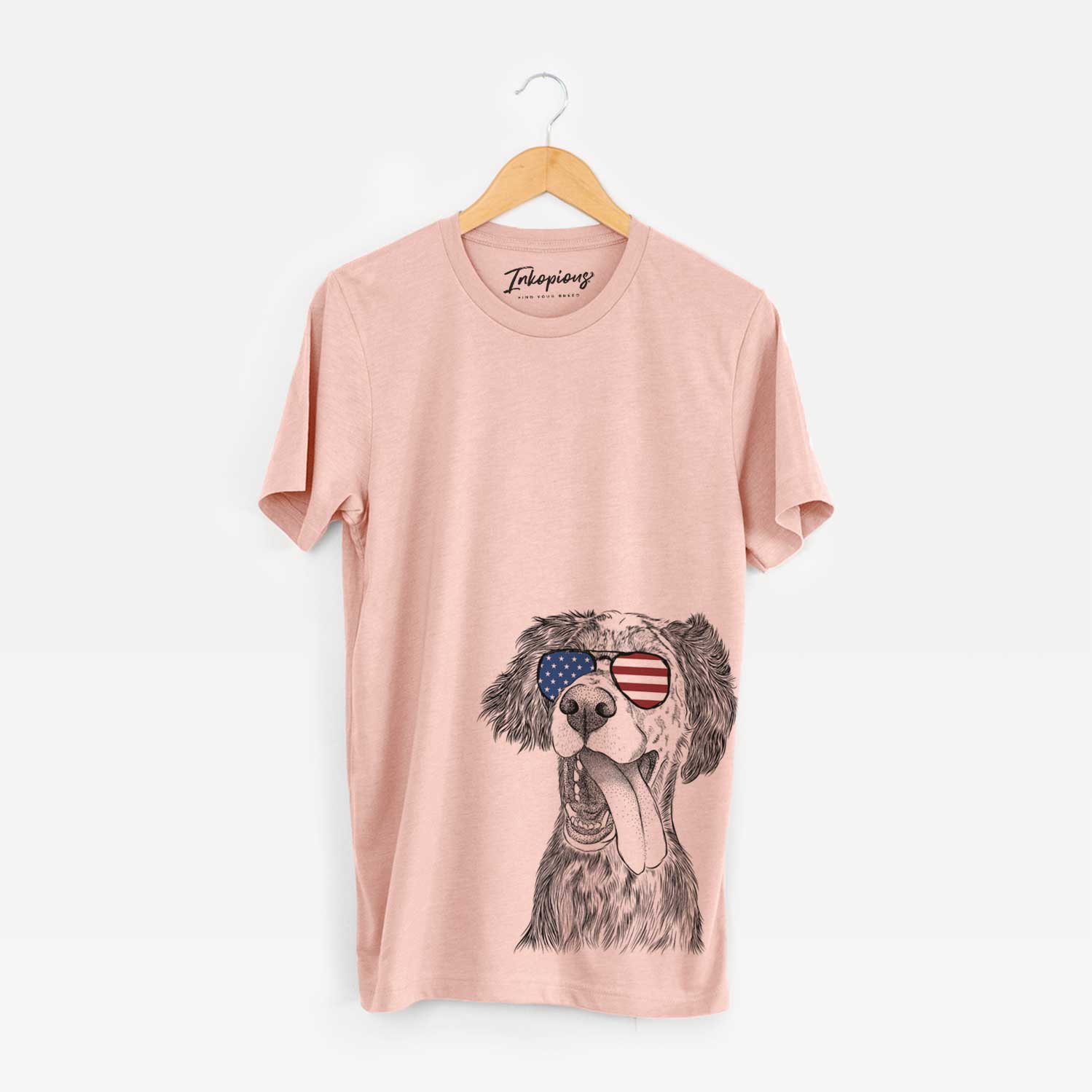 Hand-drawn sketch of Renly the English Setter wearing American flag sunglasses on a Peach Unisex crewneck