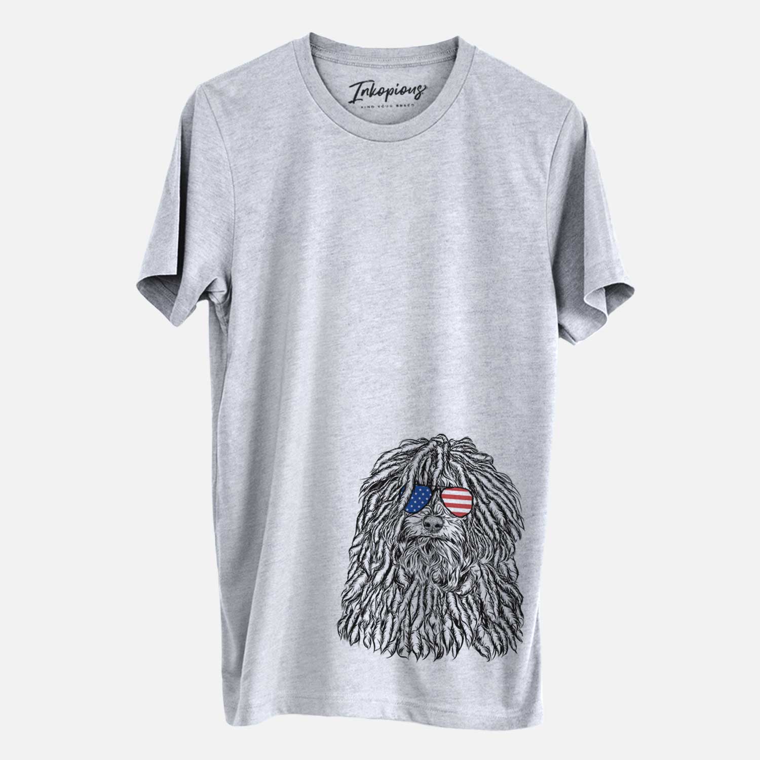 Hand-drawn sketch of Rezi the Puli wearing American flag sunglasses on a Grey Unisex crewneck