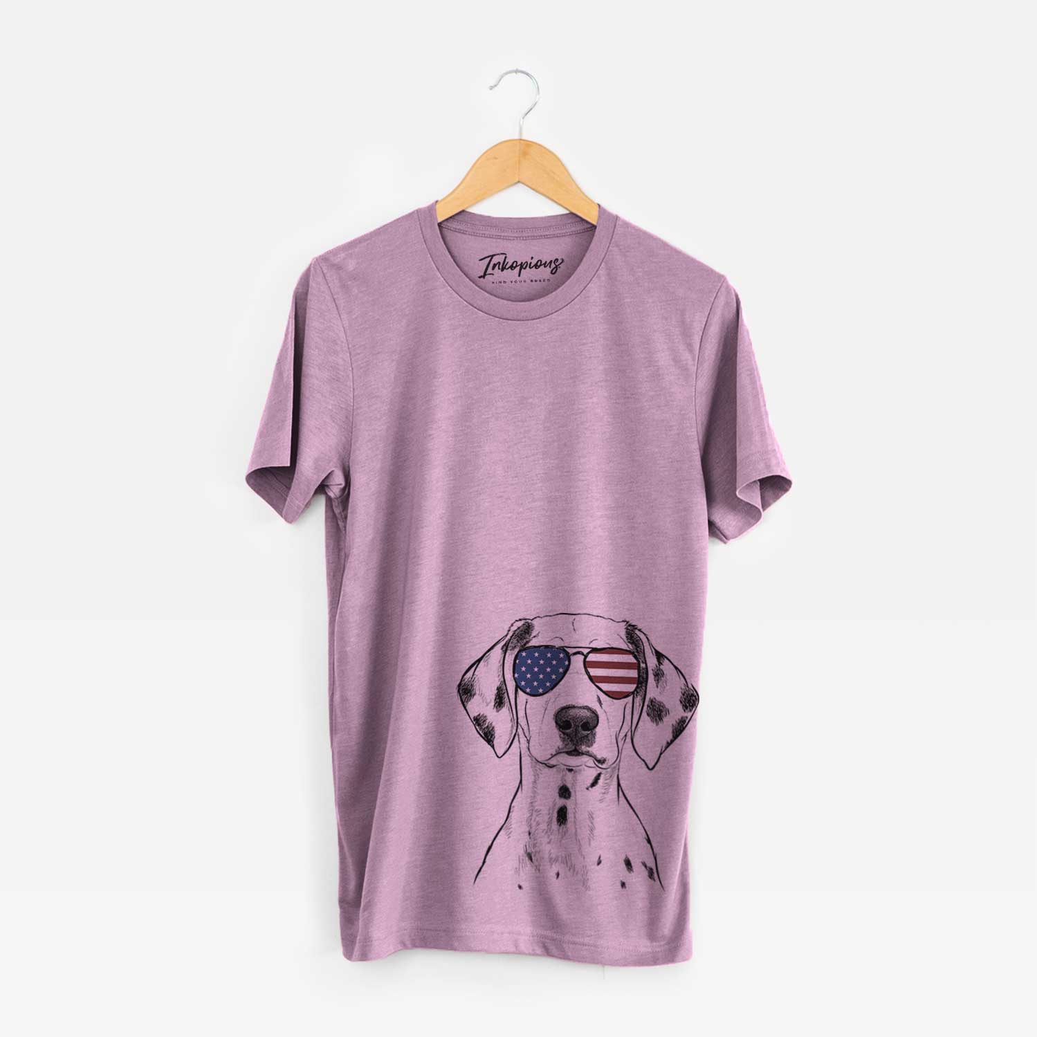 Hand-drawn sketch of Riot the Dalmatian wearing American flag sunglasses on an Orchid Unisex crewneck