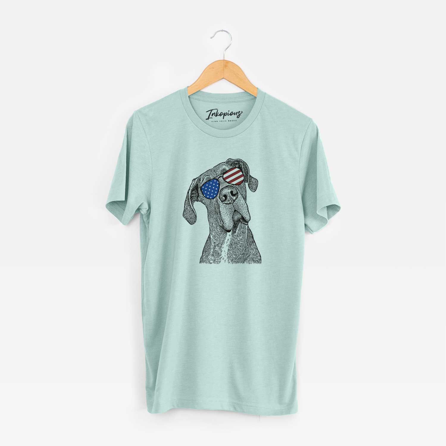 Hand-drawn sketch of River the Great Dane wearing American flag sunglasses on a Heather Sage Unisex crewneck