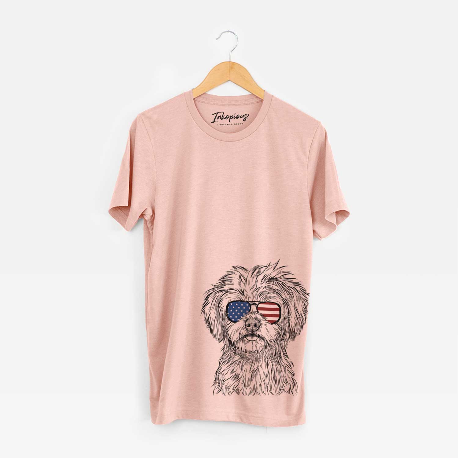 Hand-drawn sketch of Sammy the Shorkie wearing American flag sunglasses on a Peach Unisex crewneck