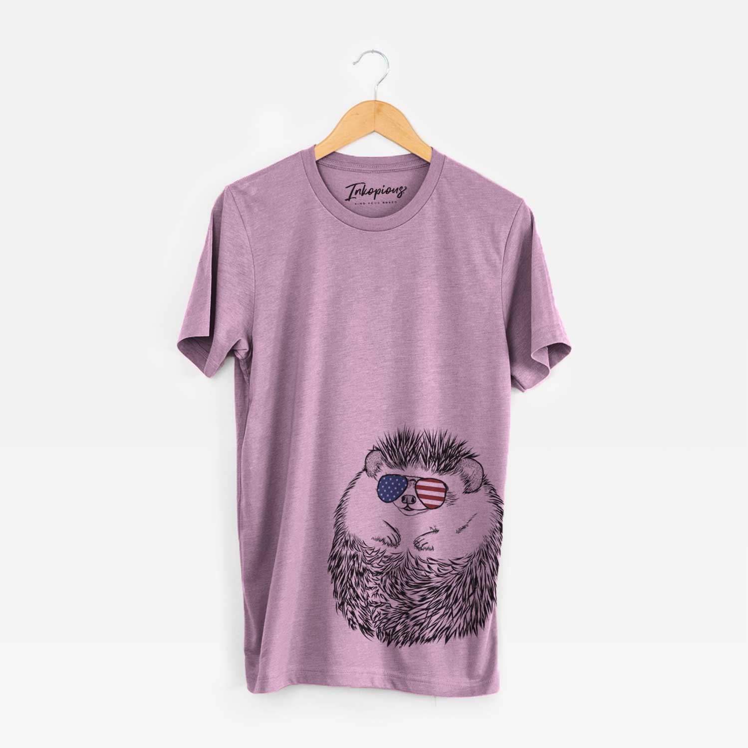 Hand-drawn sketch of Sid the Hedgehog wearing American flag sunglasses on an Orchid Unisex crewneck